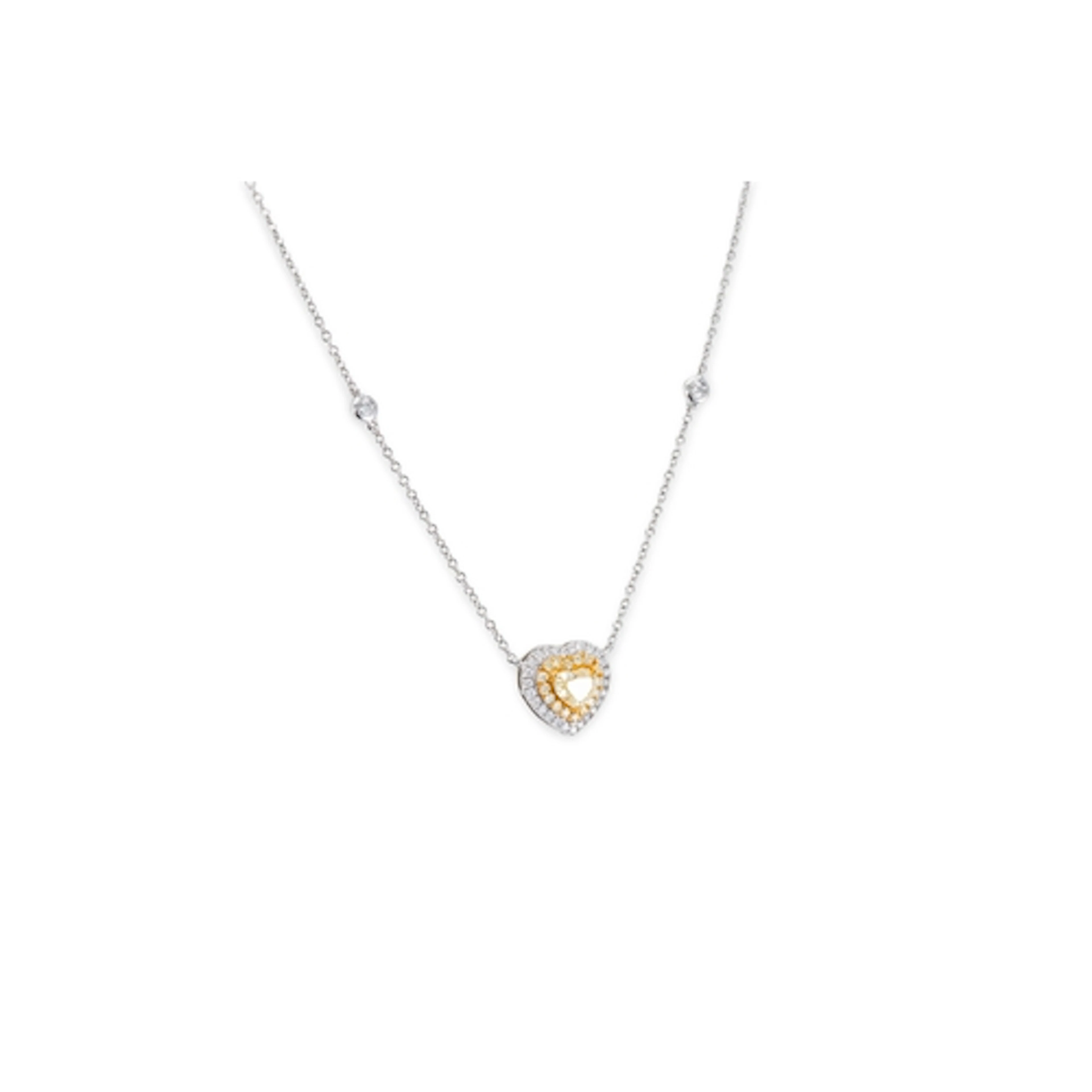 A YELLOW DIAMOND HEART SHAPED CLUSTER PENDANT, the principal...