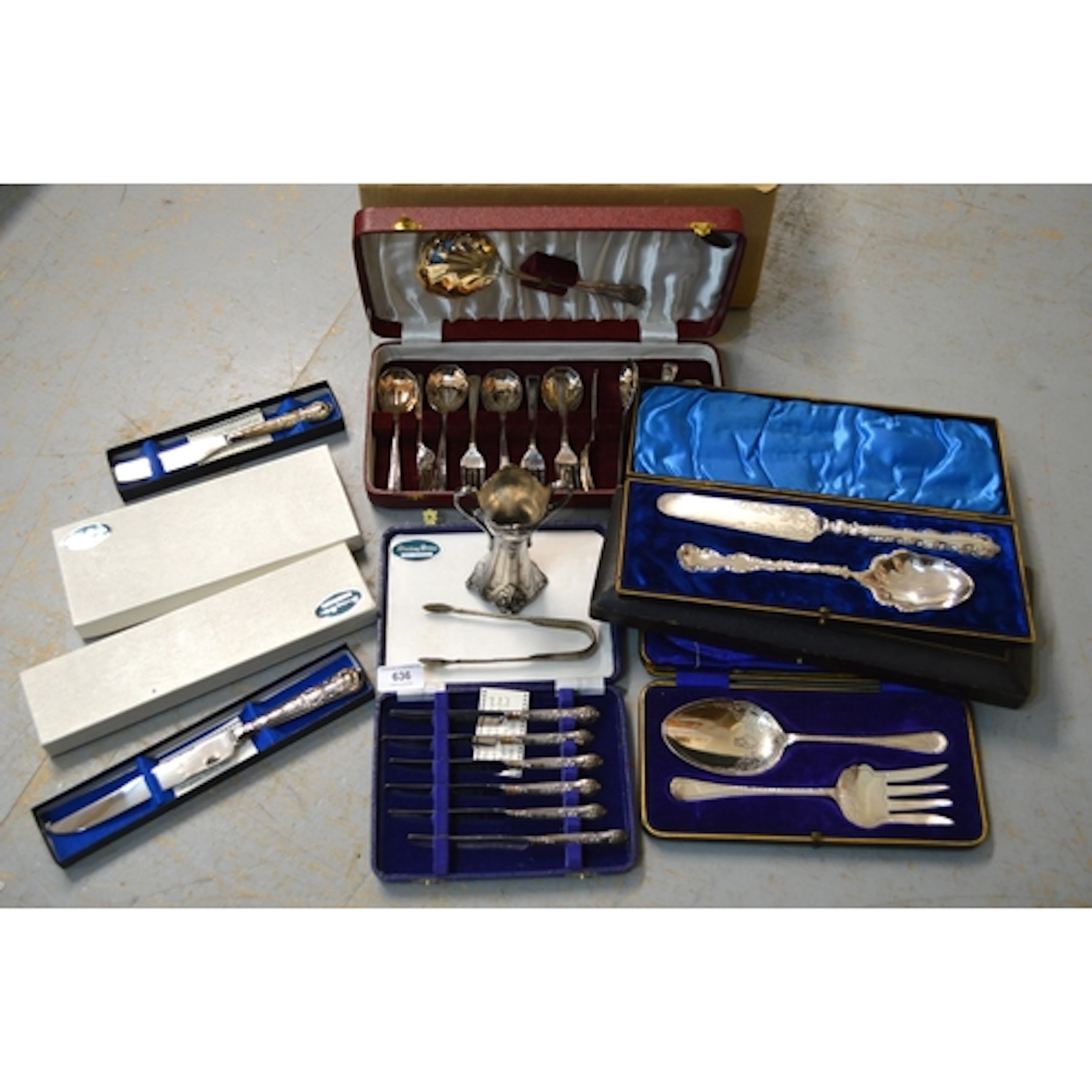Cased set of six silver handled tea knives, together with ot...