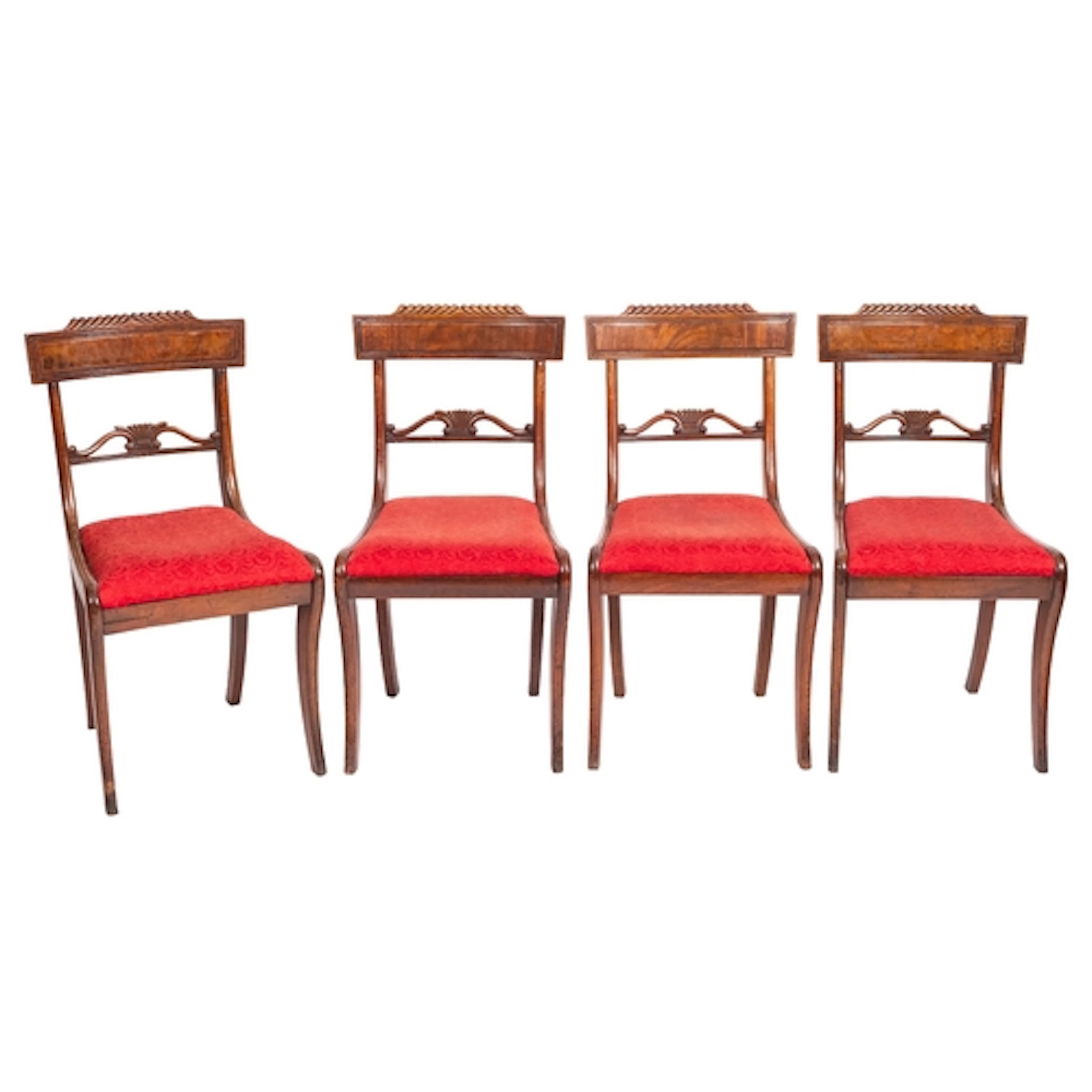 A set of twelve mahogany dining chairs in Regency style, lat...