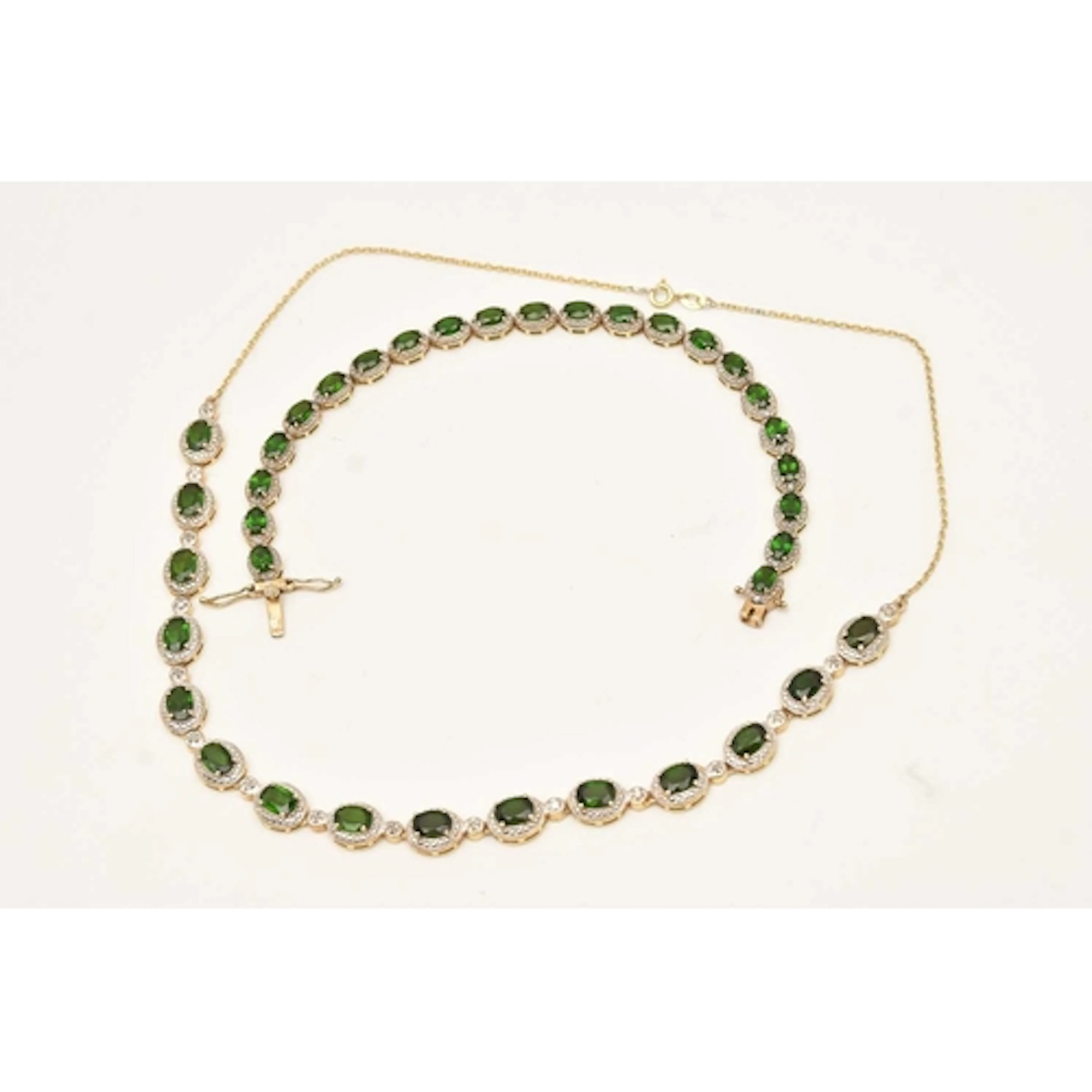 A SILVER LINE BRACELET AND NECKLACE, a gold plated bracelet ...