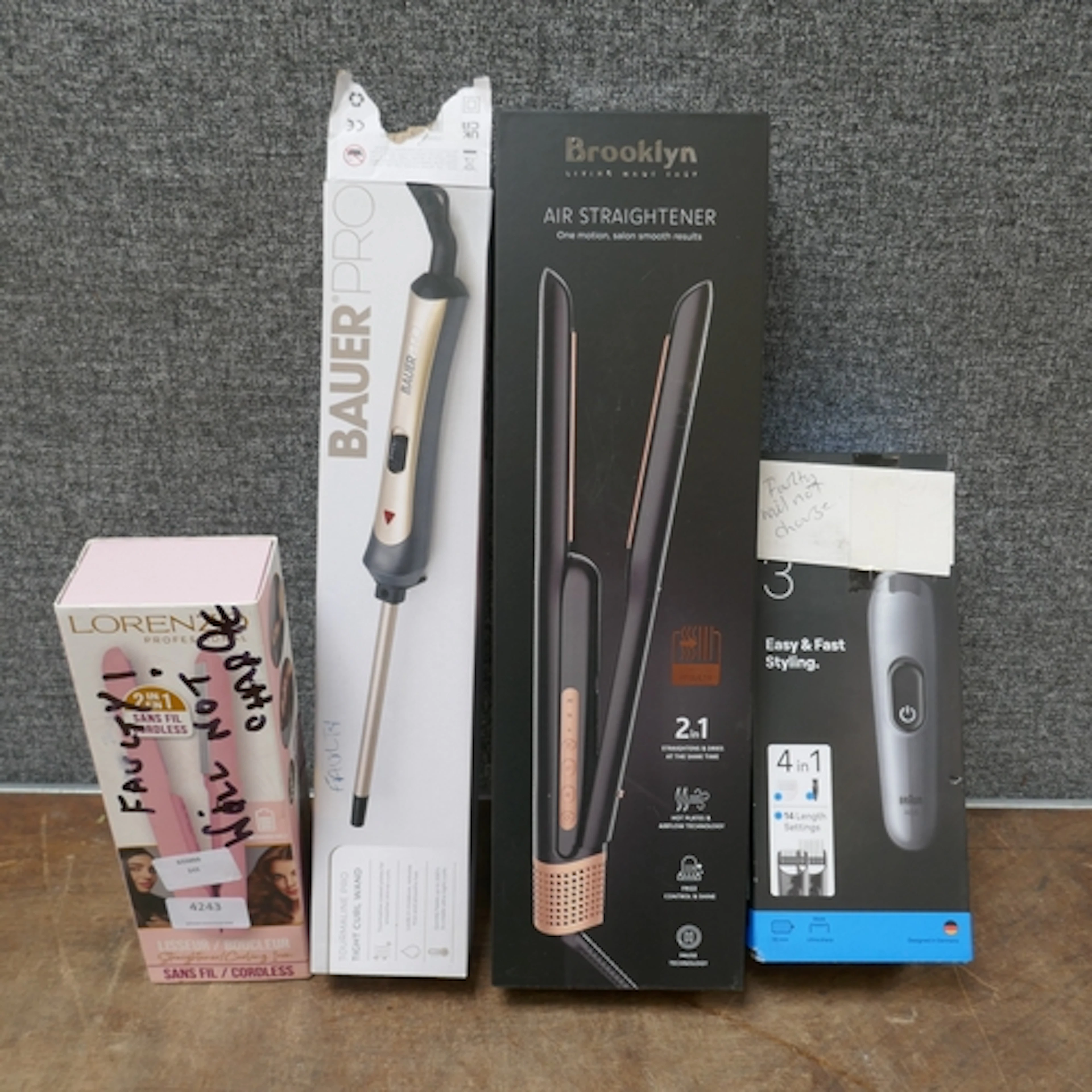 Two mixed hair straighteners, hair curling wand and a Braun ...