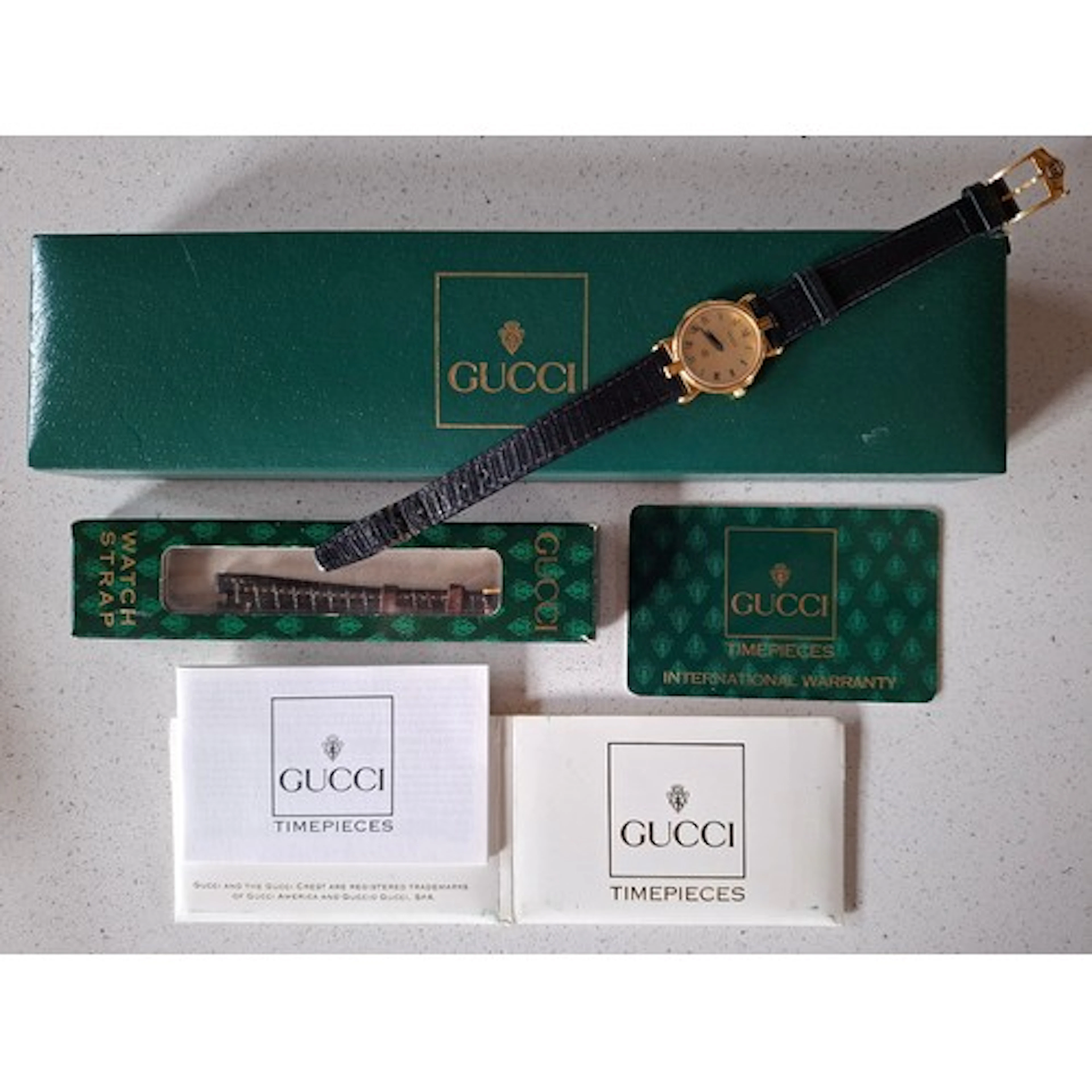 Gucci- A 1993 ladies 3400F watch having a gold plated case, ...