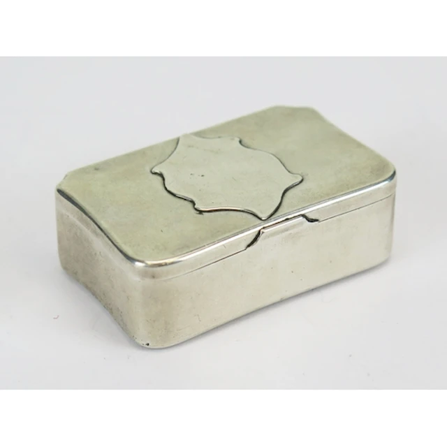 A Russian silver snuff box, of rectangular outline with appl...