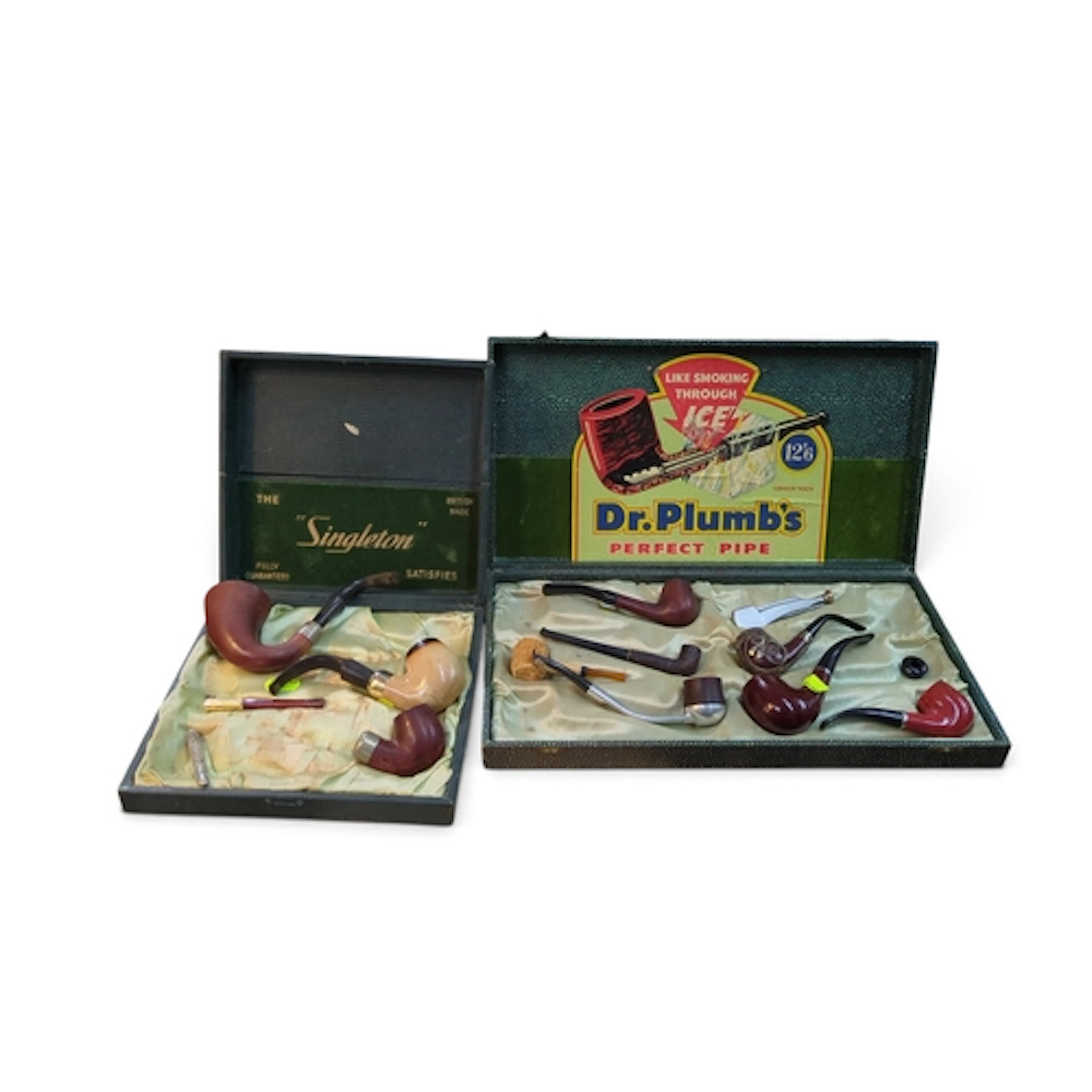A collection of vintage tobacco pipes in assorted briar, cor...