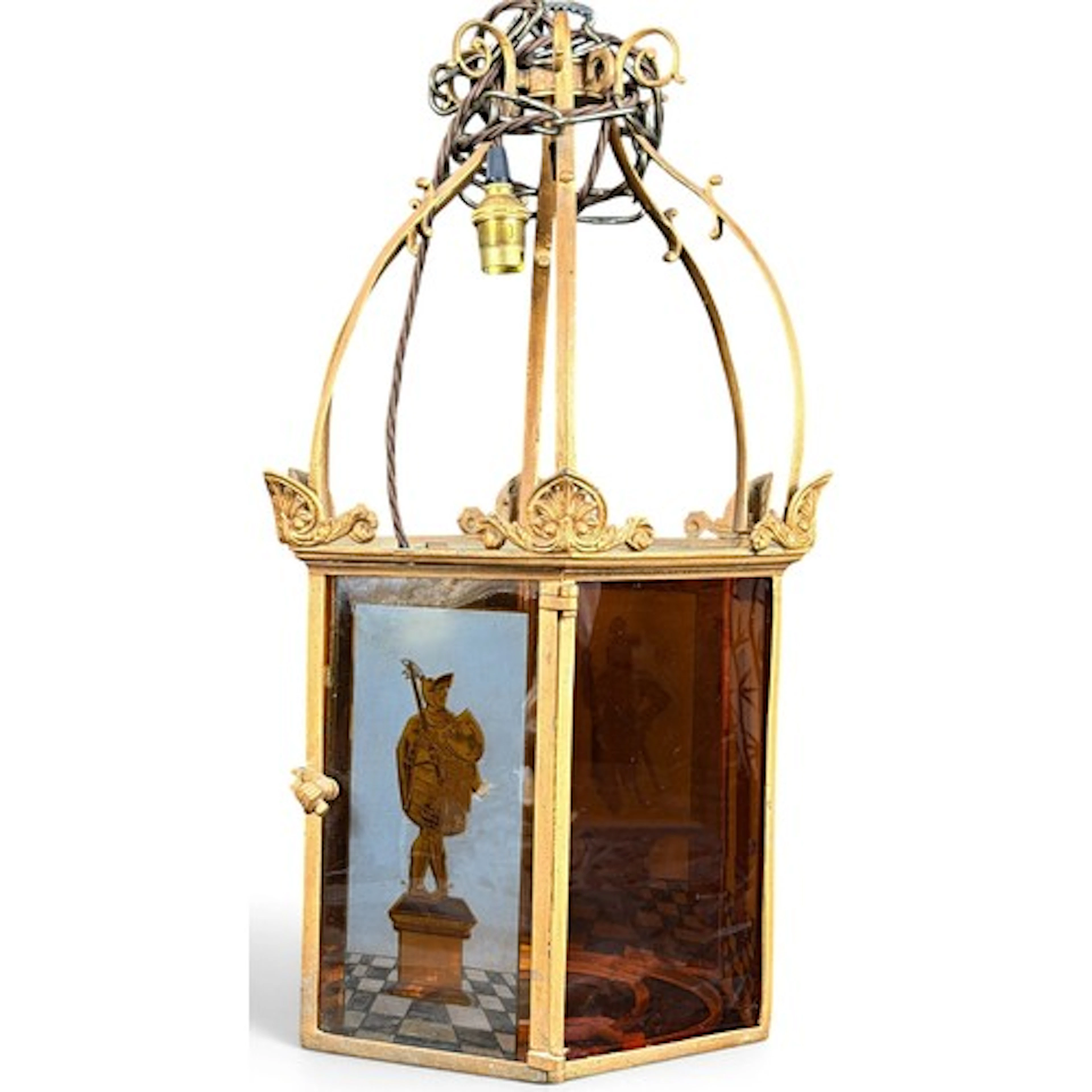 A decorative hexagonal porch lantern set with amber stained ...