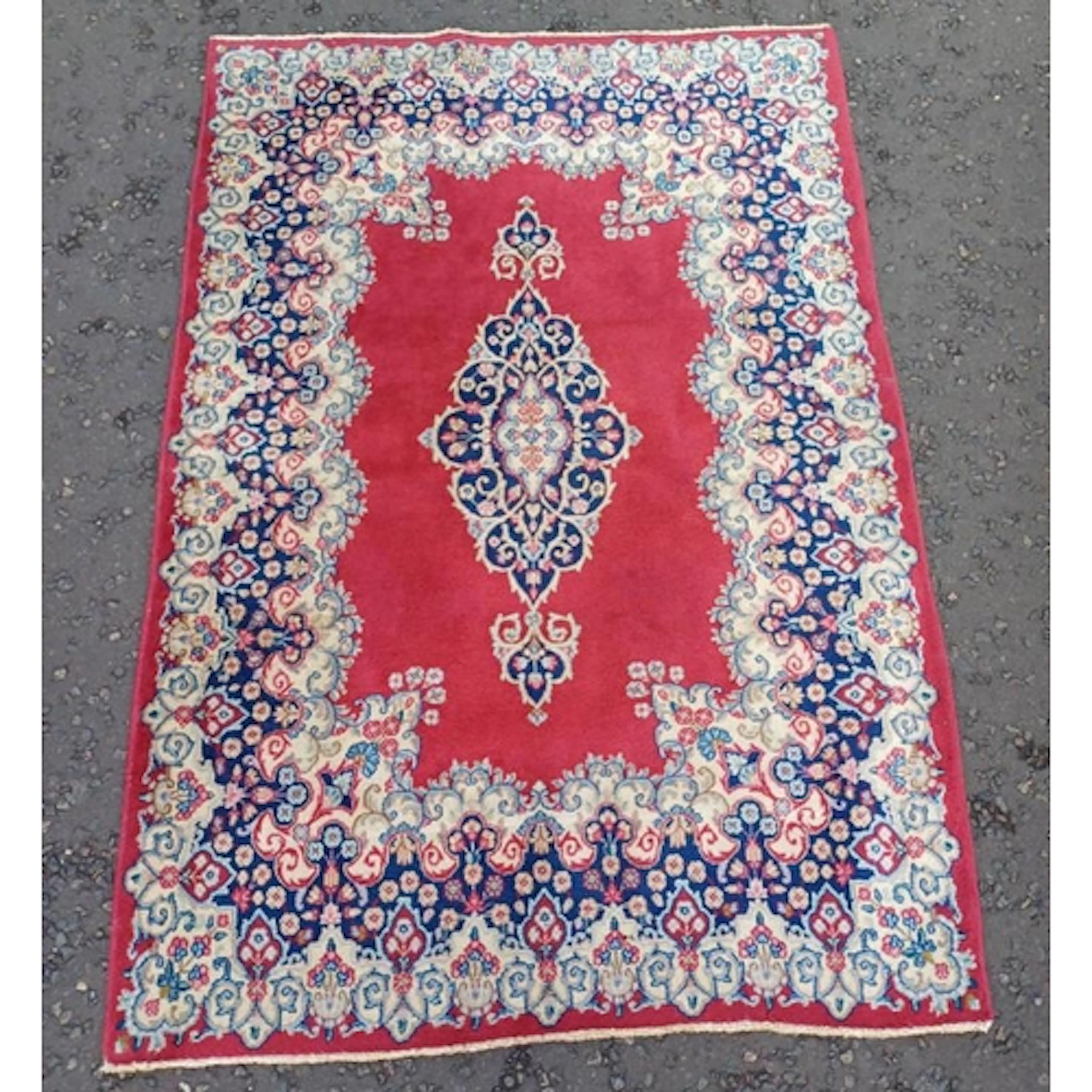 RICH RED GROUND KERMAN HAND WOVEN RUG WITH CENTRAL FLORAL ME...
