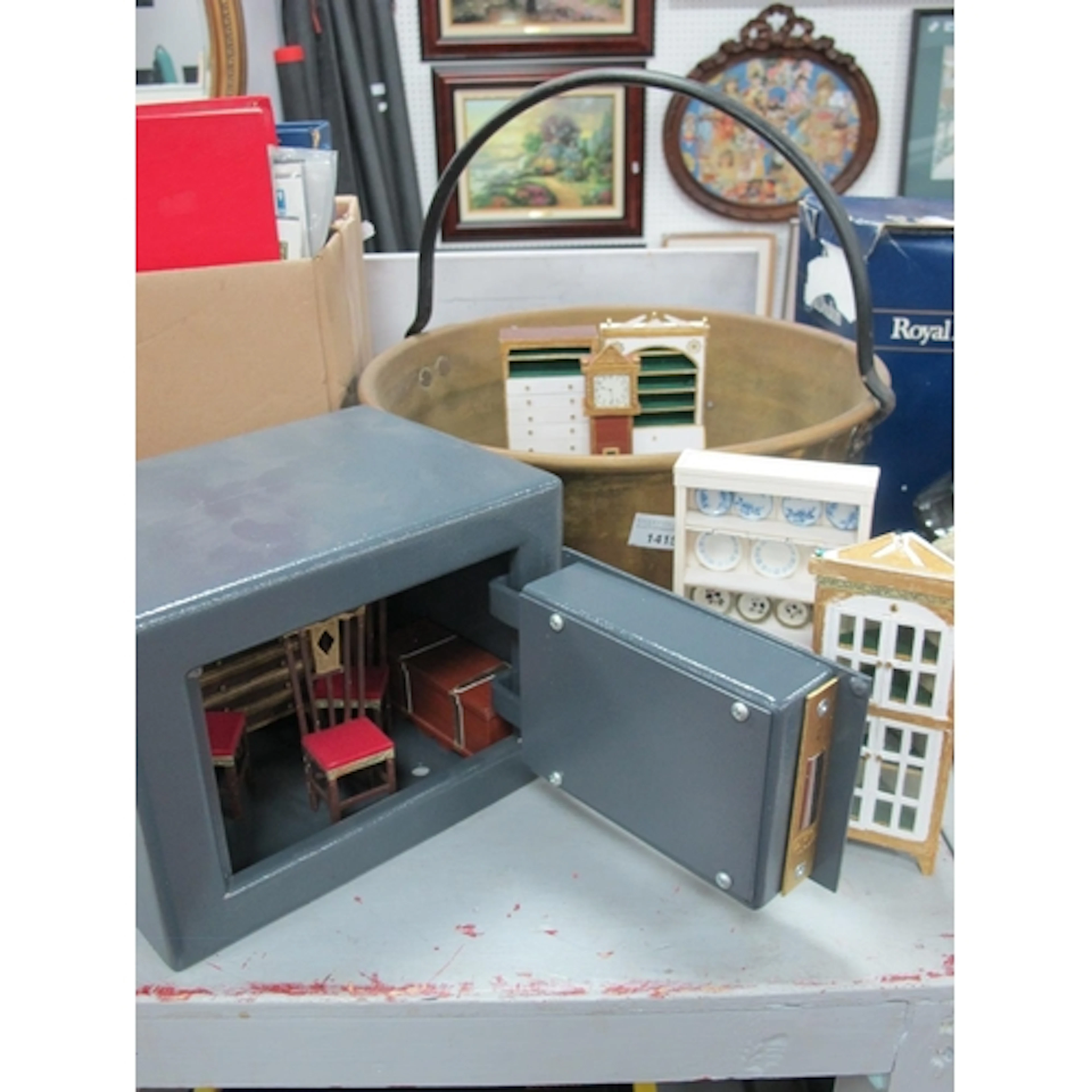 Omega Safe with key, doll's furniture in a brass jam pan.