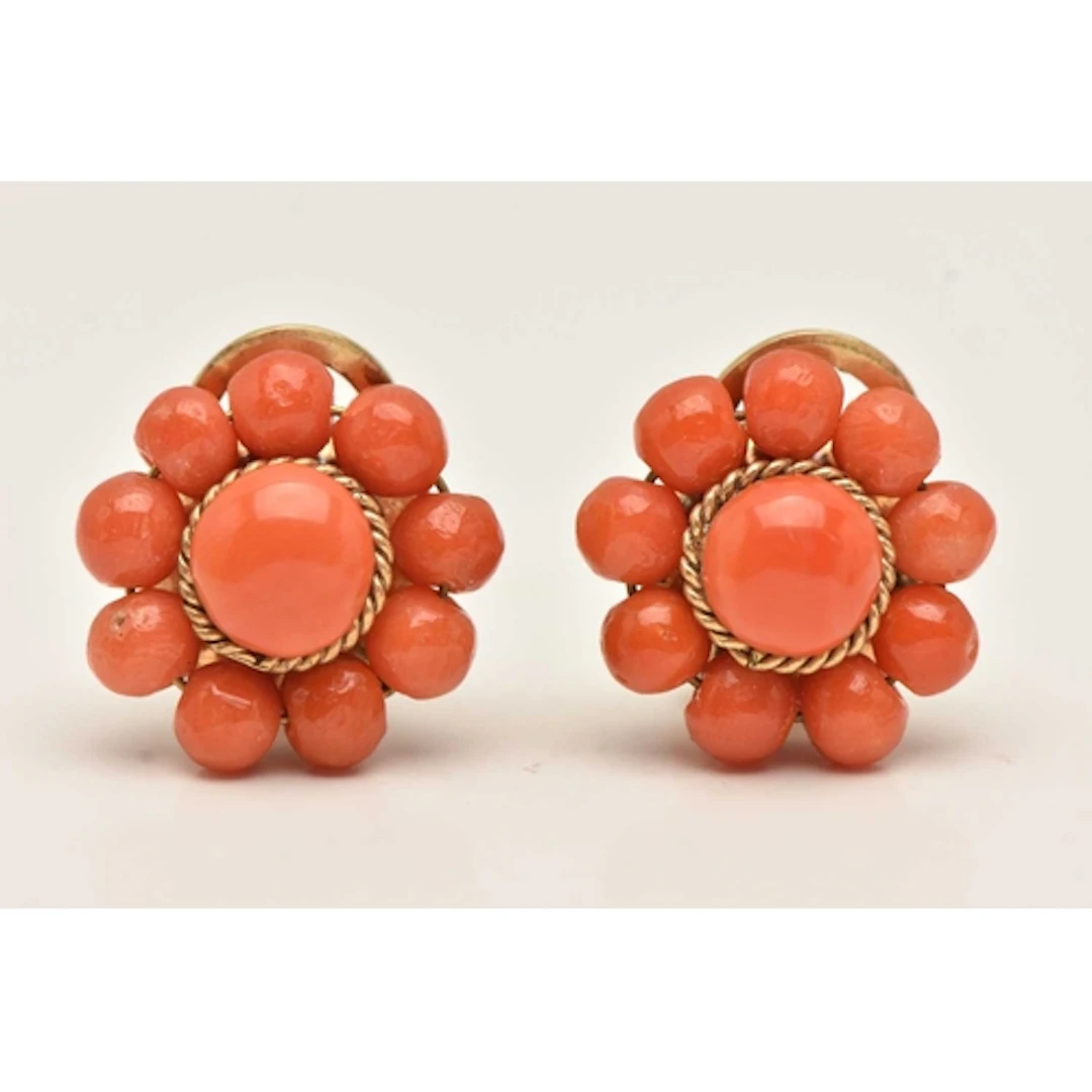 A PAIR OF GILT METAL CORAL CLIP ON EARRINGS, each of a circu...