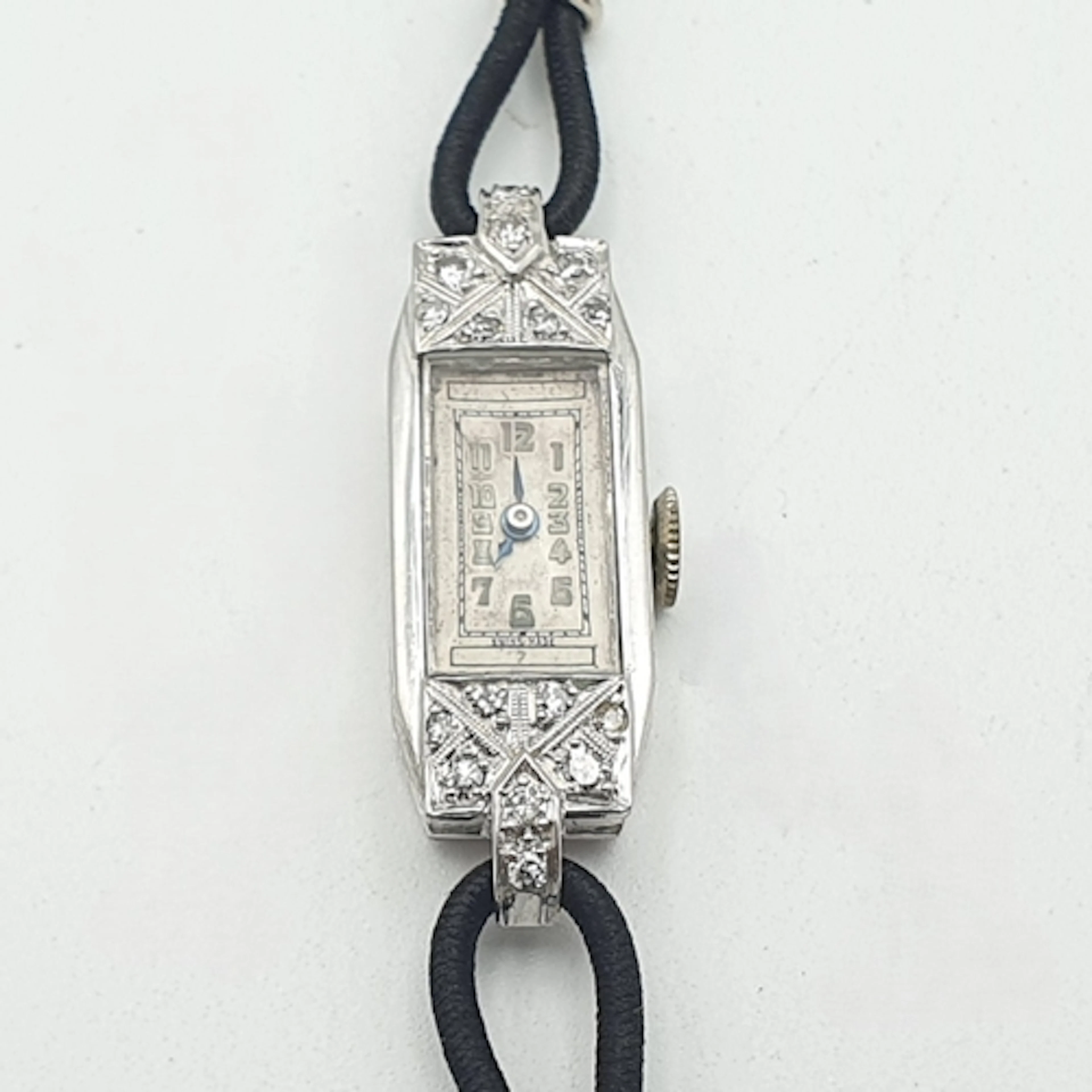 An Art Deco Platinum and Diamond Cocktail Wristwatch, the re...