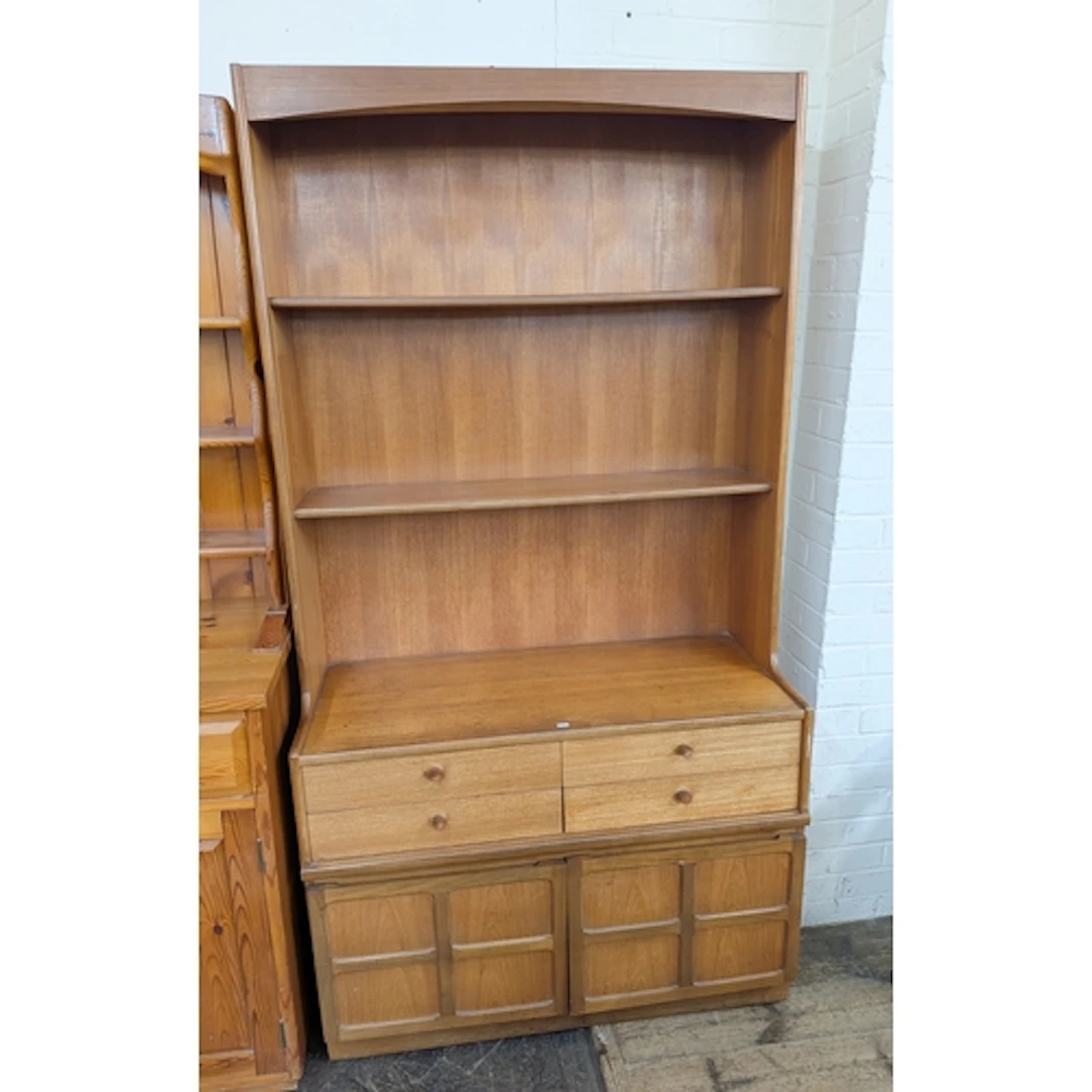 A Nathan teak lounge bookcase unit, fitted open shelves, fou...