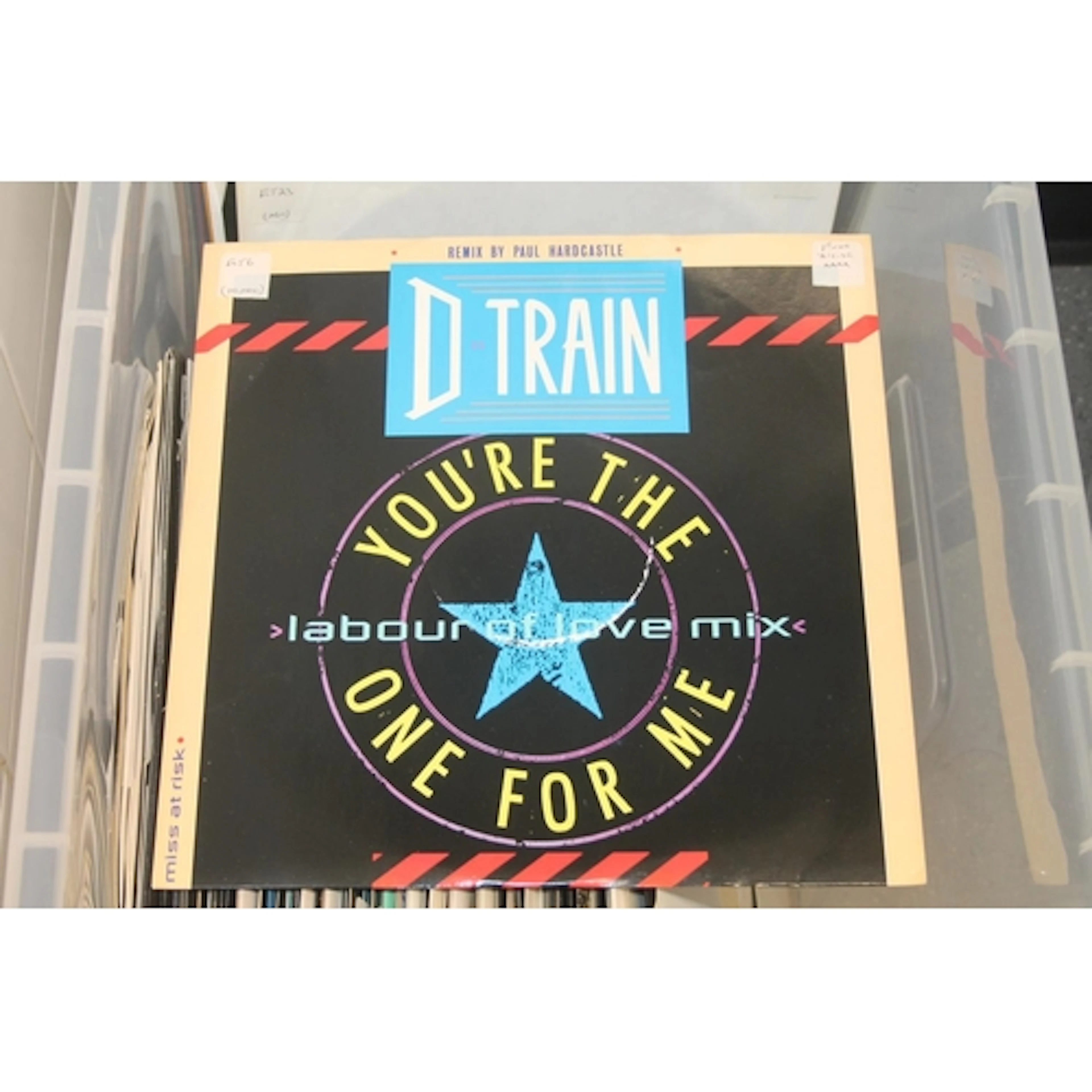 Large plastic box containing 12'' vinyl singles to include m...