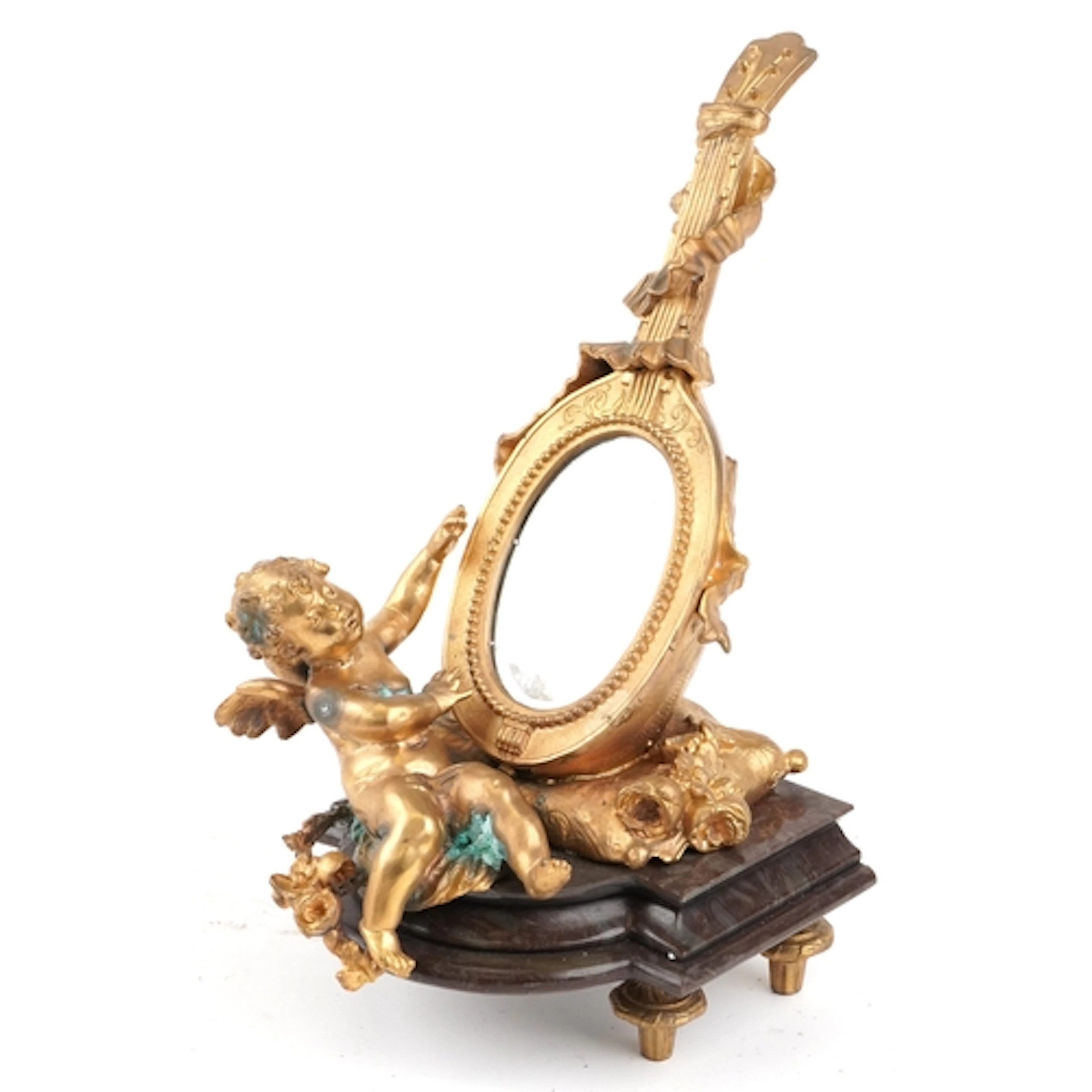 A French style gilt bronze mandolin and Putti design mirror ...