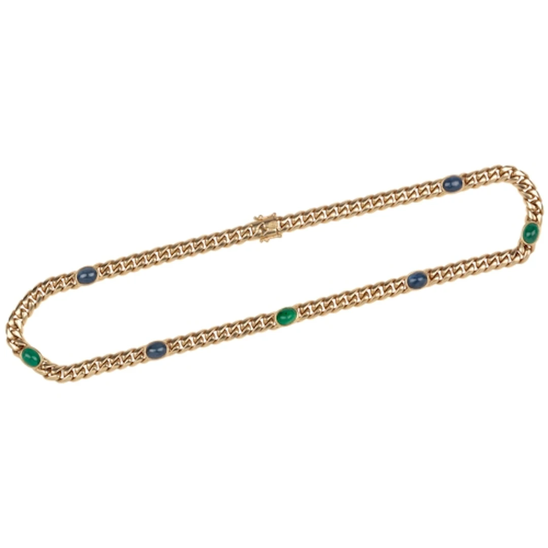 An 18ct gold, emerald and sapphire necklace, of curb linking...