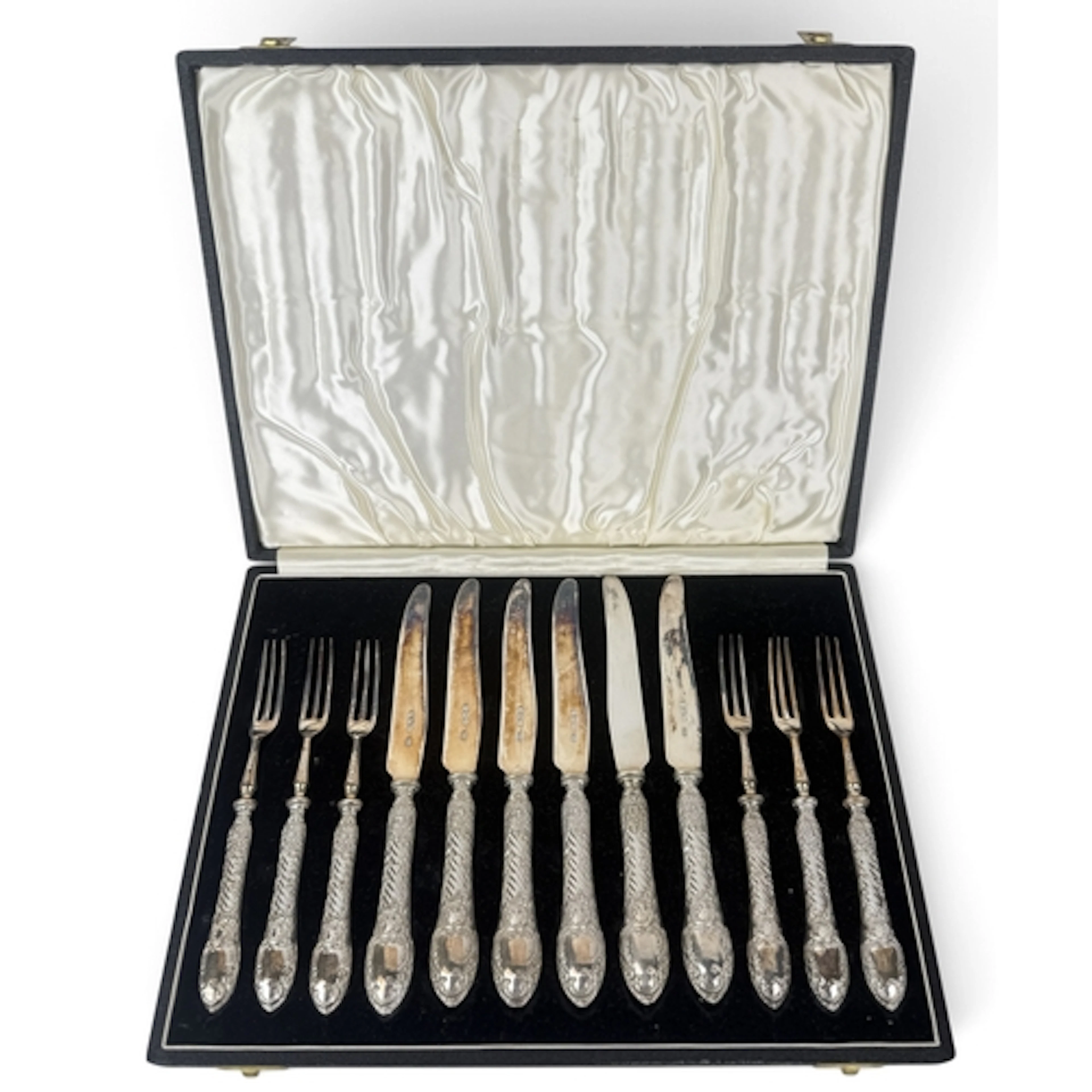 A SET OF SIX PAIRS OF LATE VICTORIAN SILVER DESSERT KNIVES A...