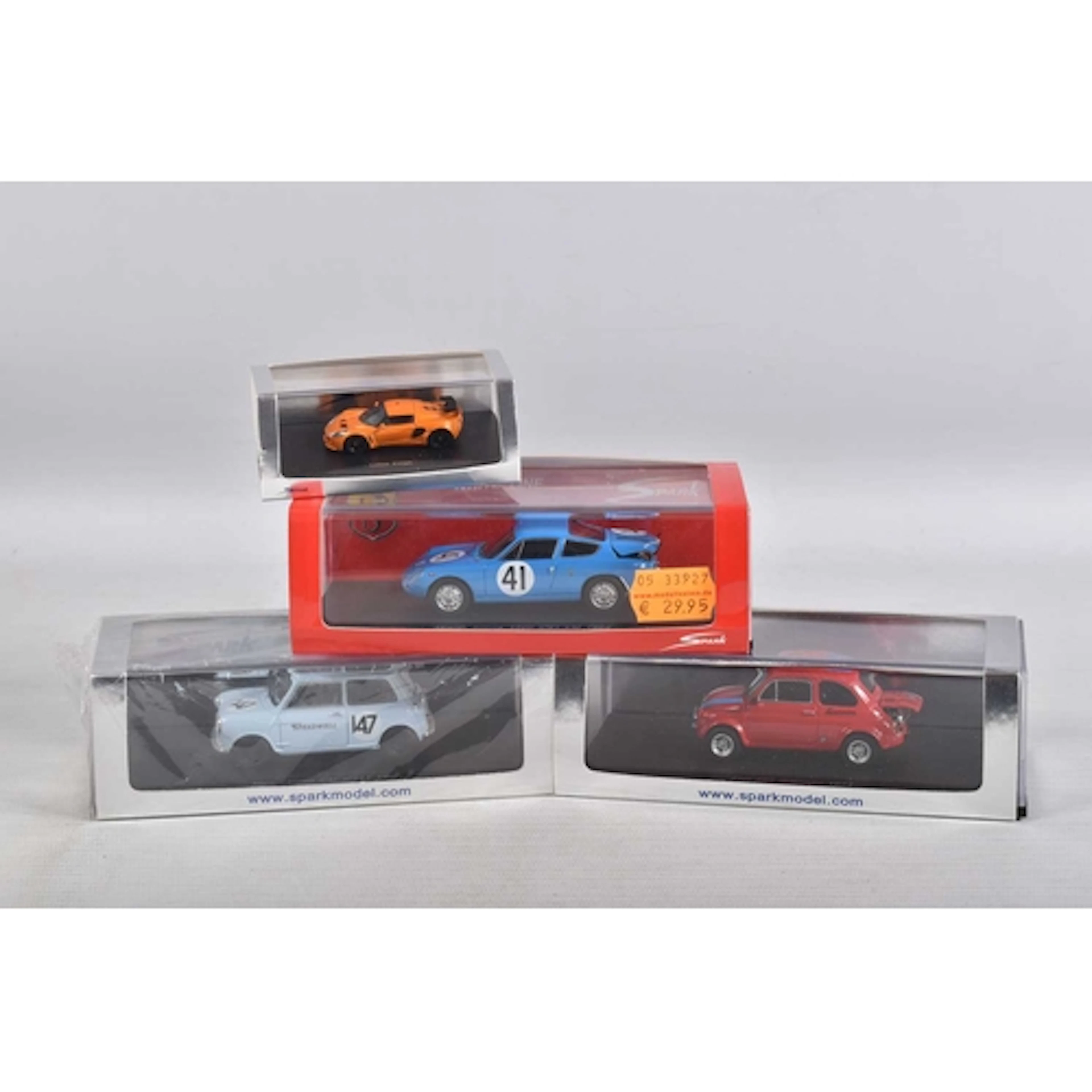 FOUR BOXED MINIMAX SPARK MODEL VEHICLES, to include a sealed...