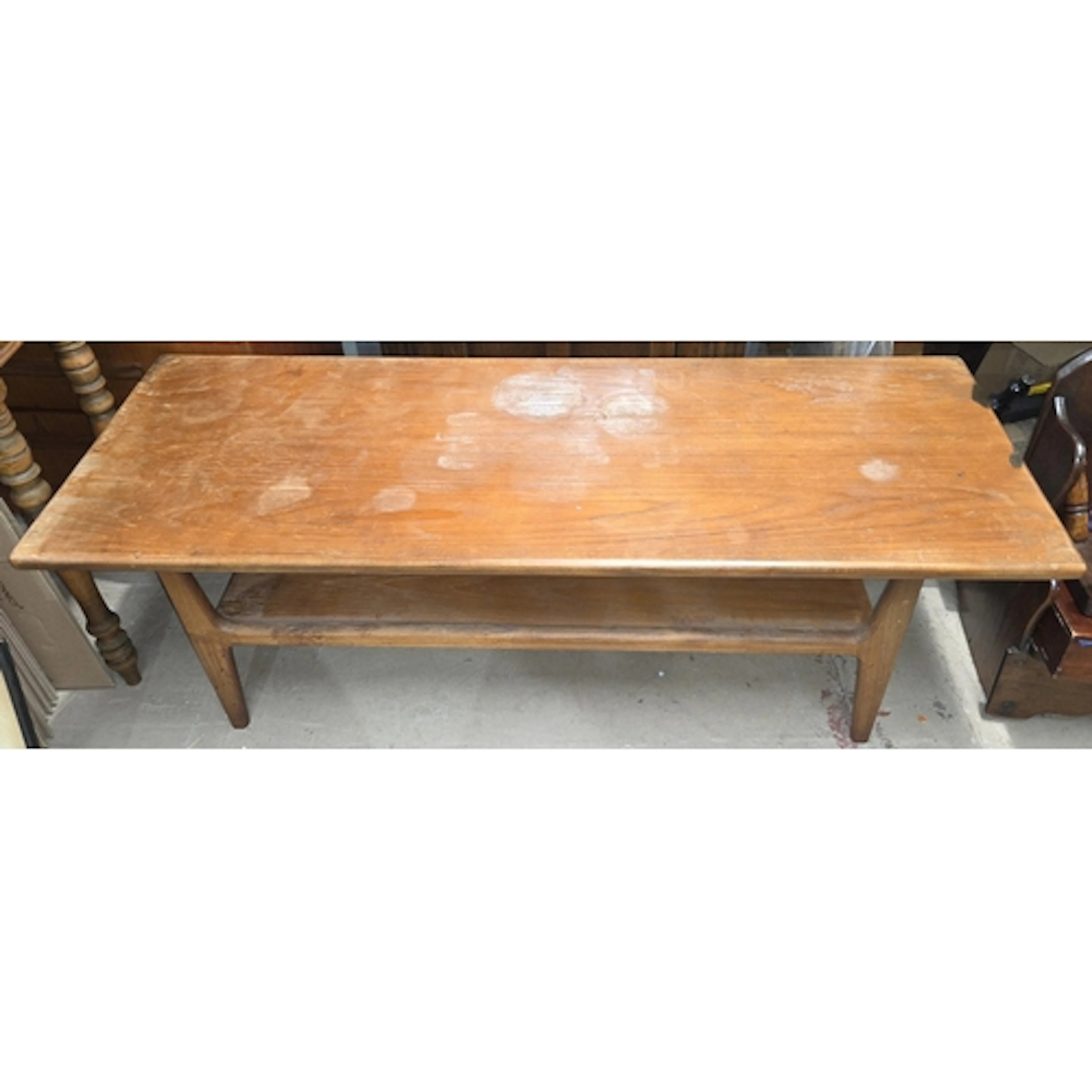 A large mid 20th century teak coffee table