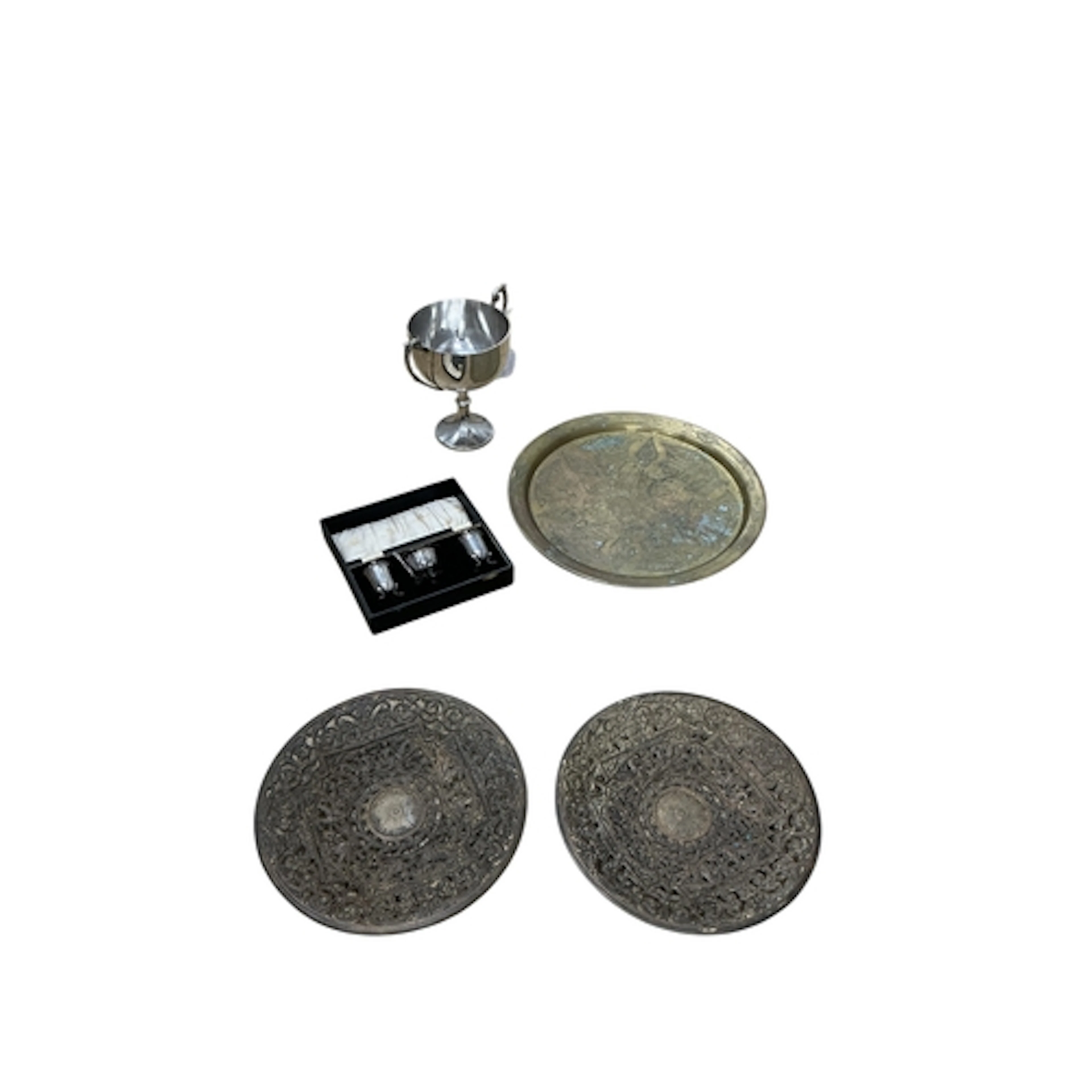 A mixed group of metalware comprising a Middle Eastern engra...