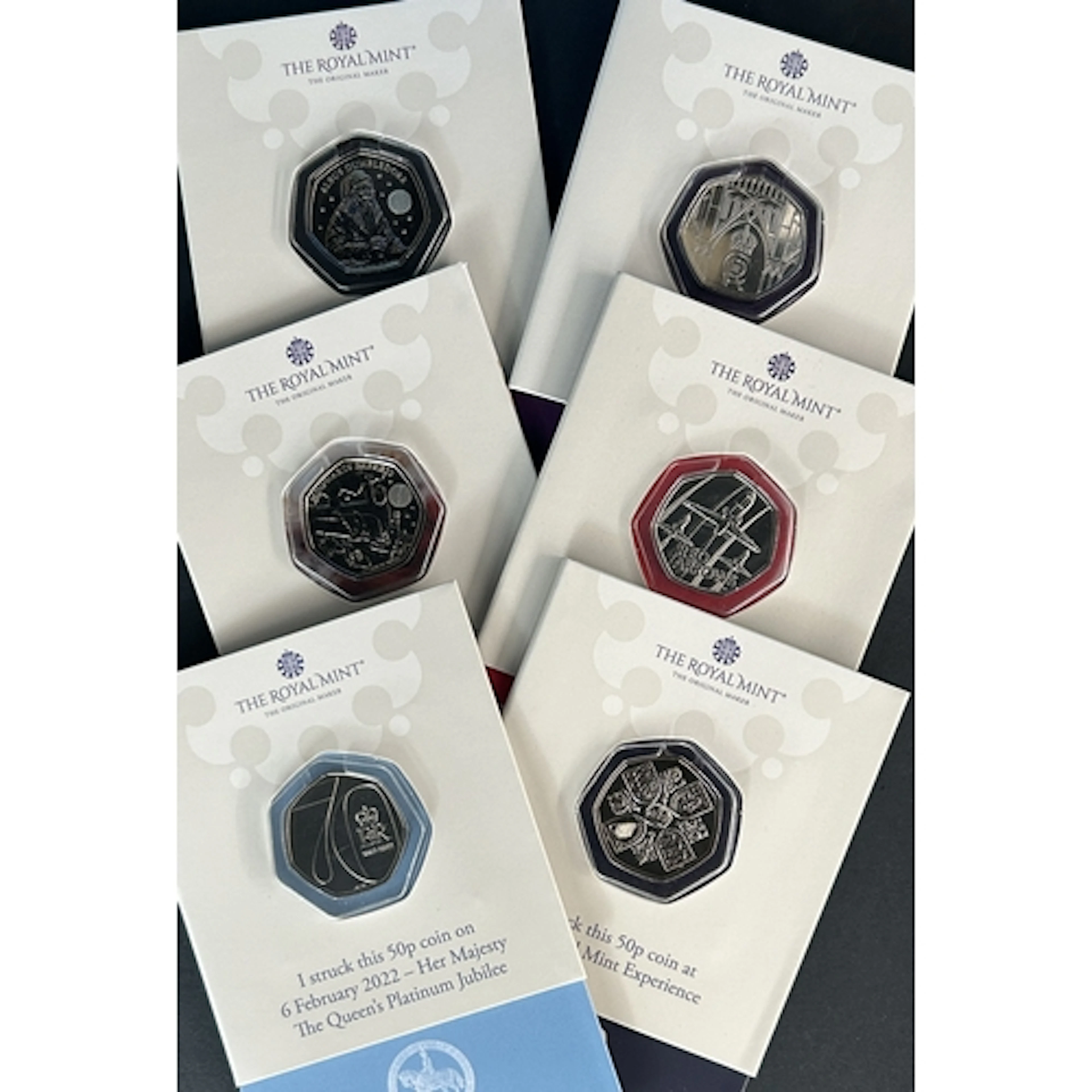 A group of six Great Britain Royal Mint Strike Your Own coin...