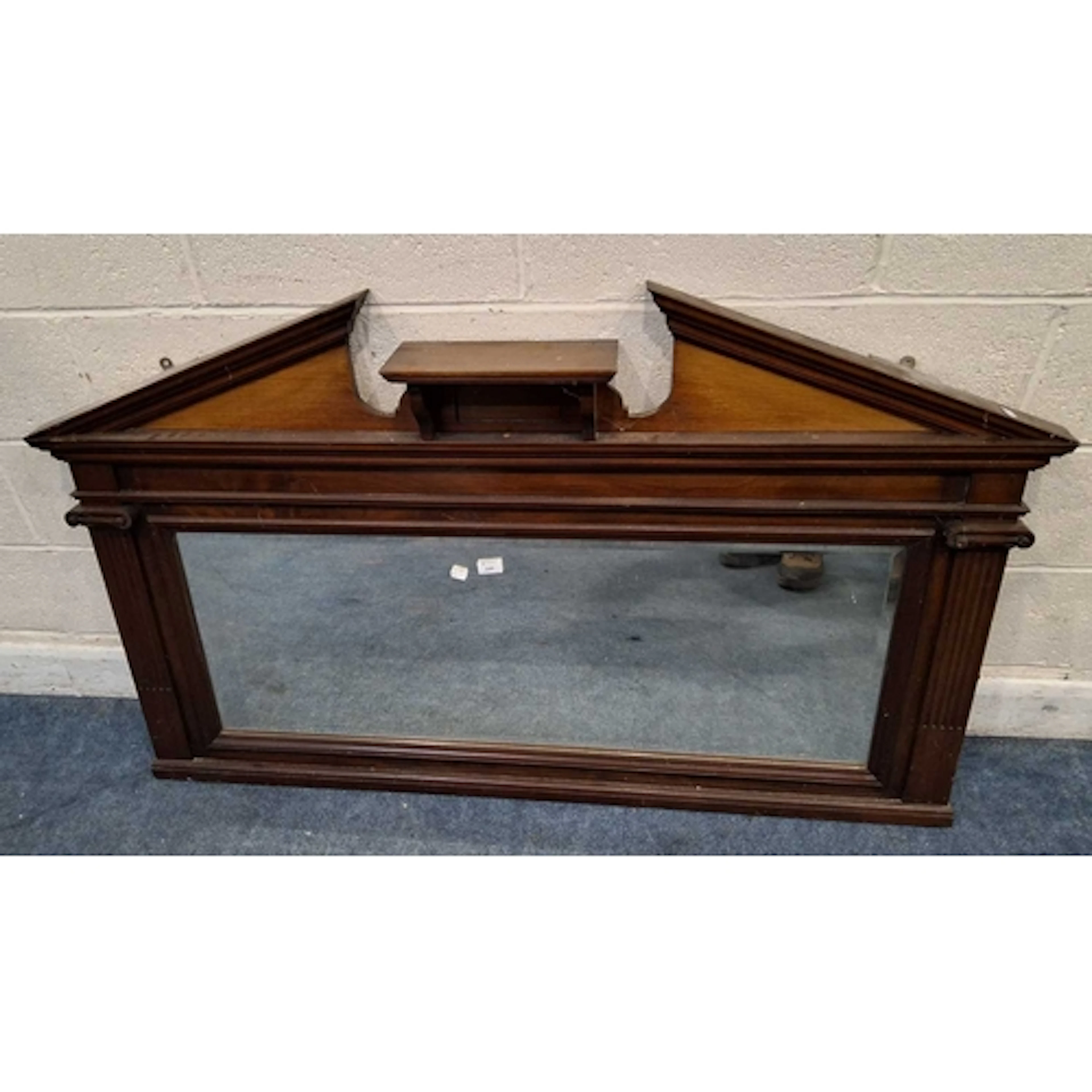 A 20TH CENTURY MAHOGANY OVERMANTEL MIRROR, with a broken arc...