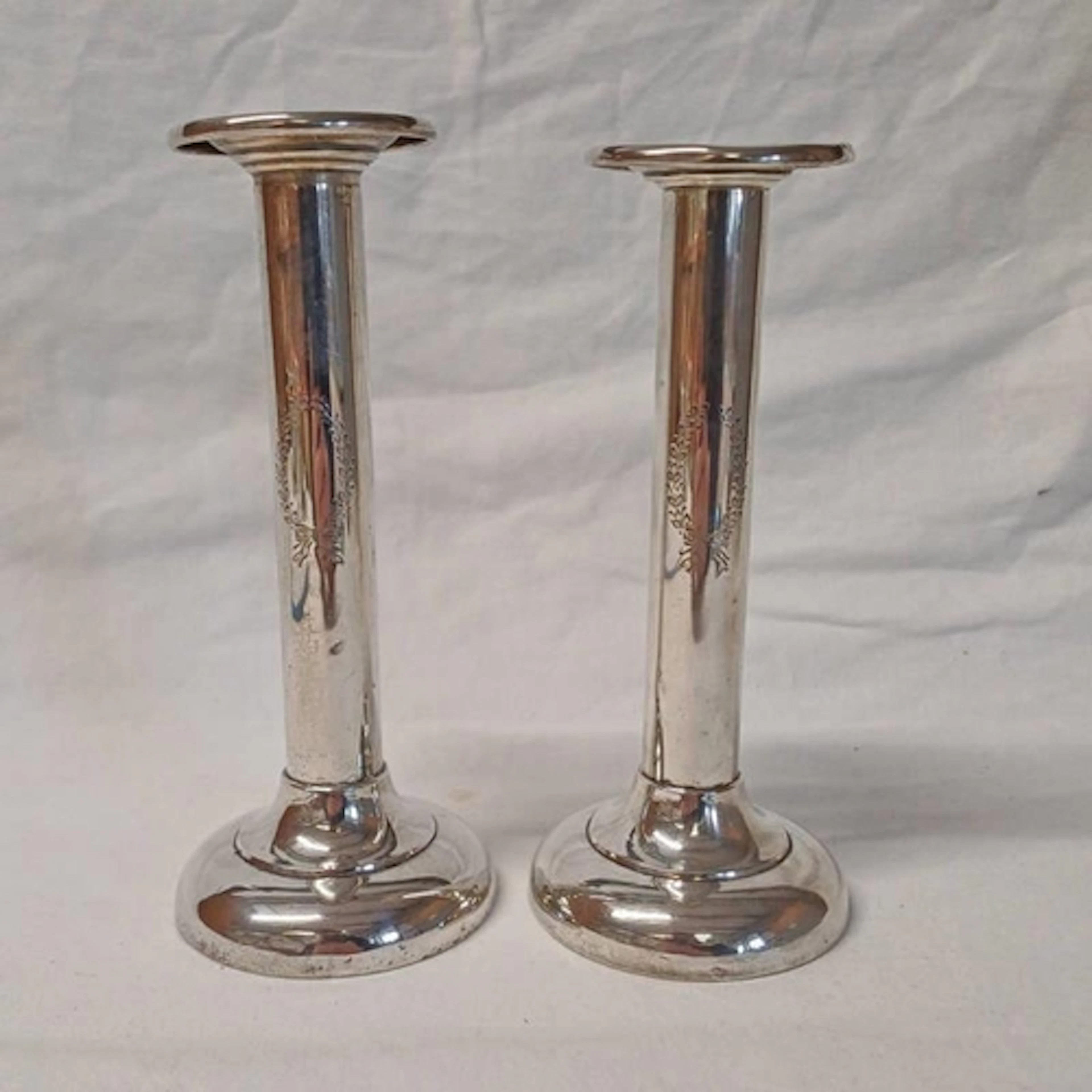PAIR STERLING SILVER CANDLESTICKS ON CIRCULAR BASES BY BIRKS...