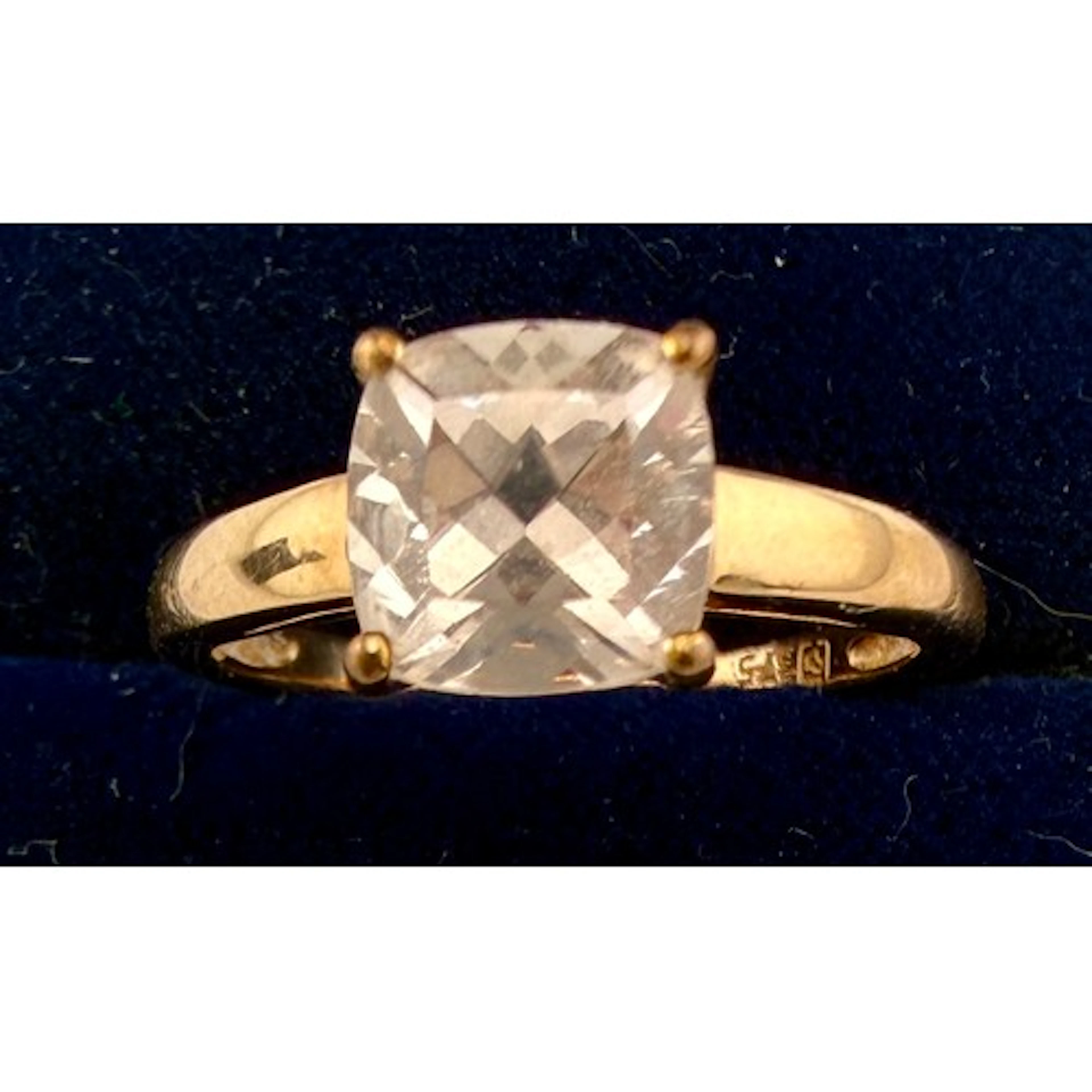 A 9 carat gold gem set ring. Size N. Weight 1.9gm.