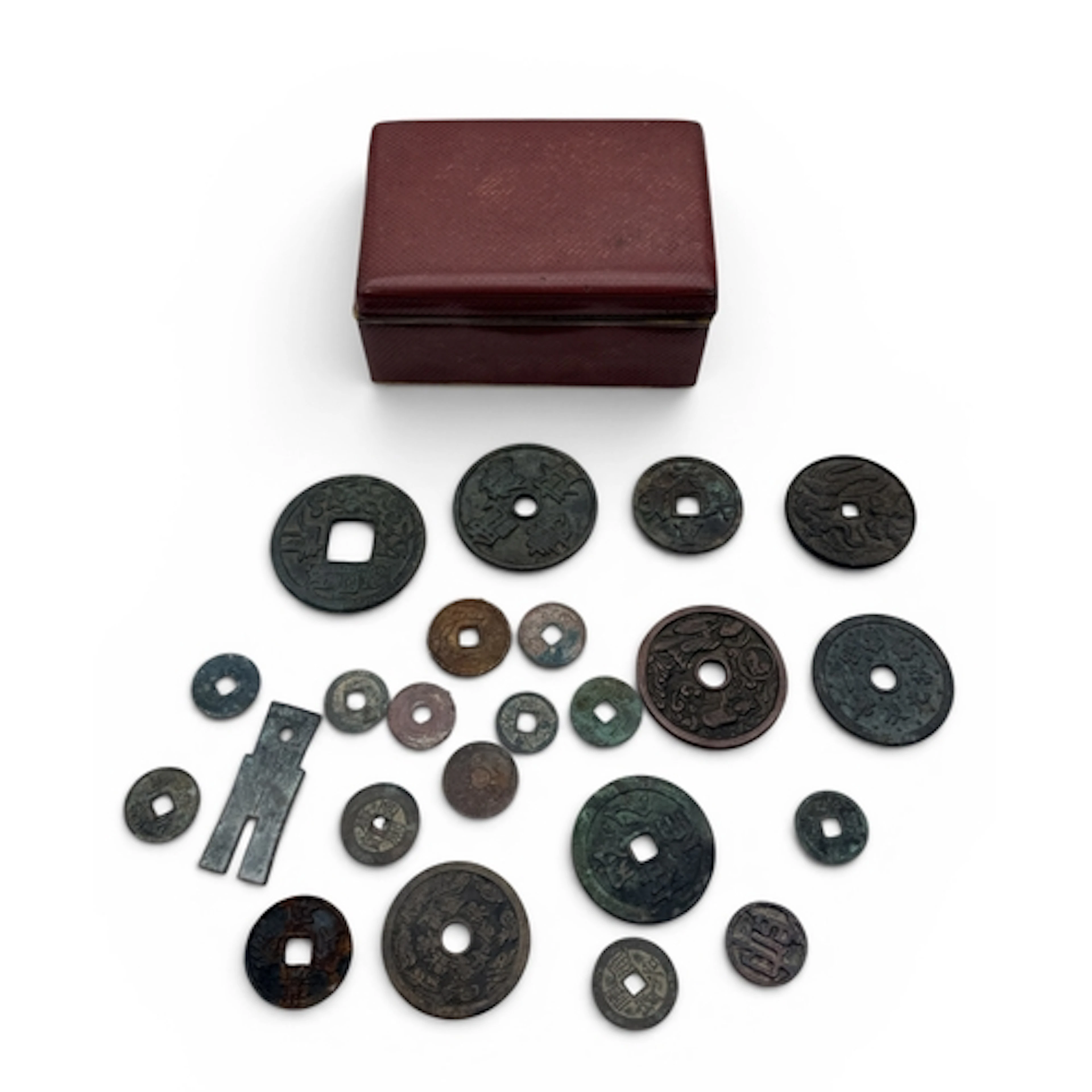 A COLLECTION OF CHINESE BRONZE COINS With associated box....