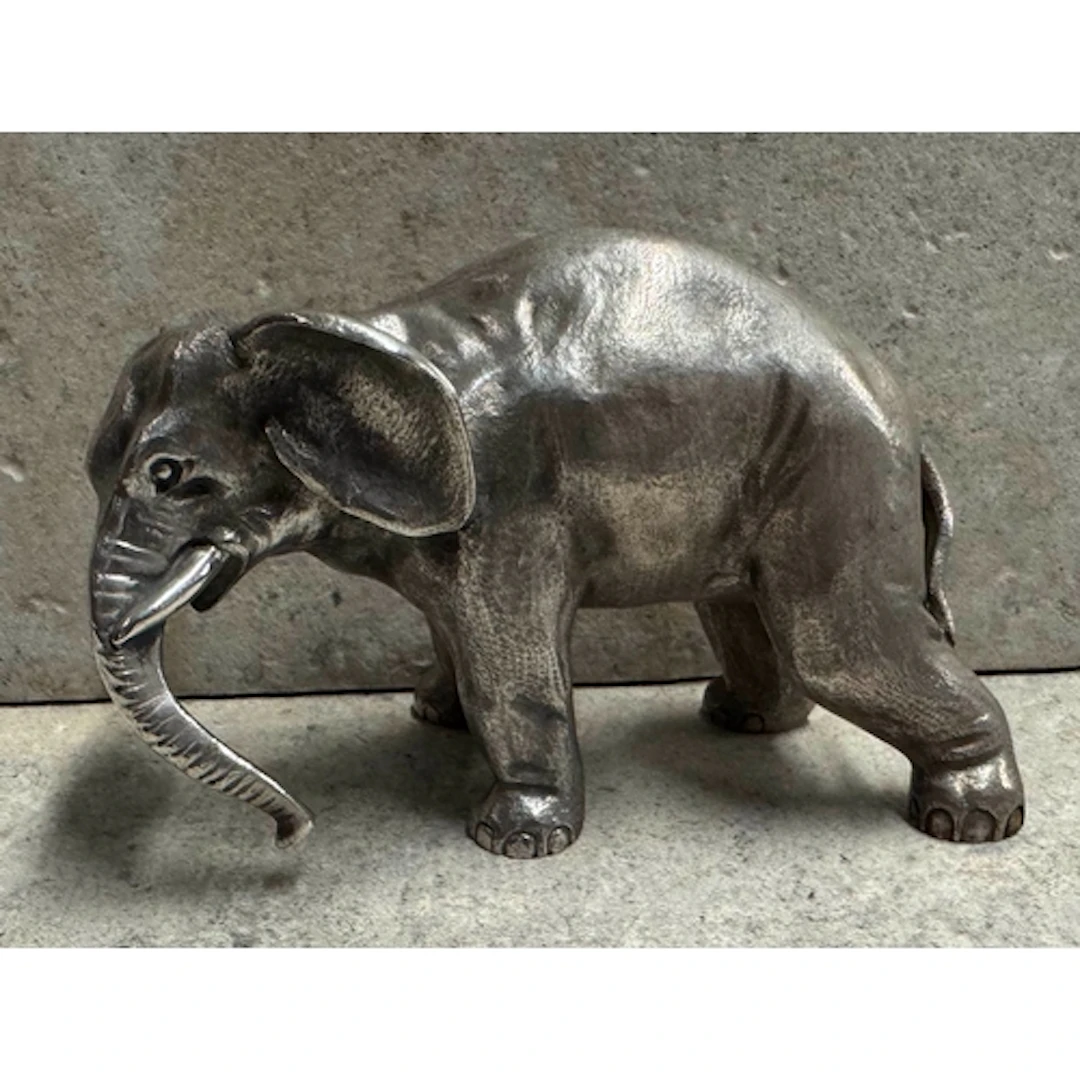 FABERGÉ: A 19th Century Russian silver cast elephant. Approx...