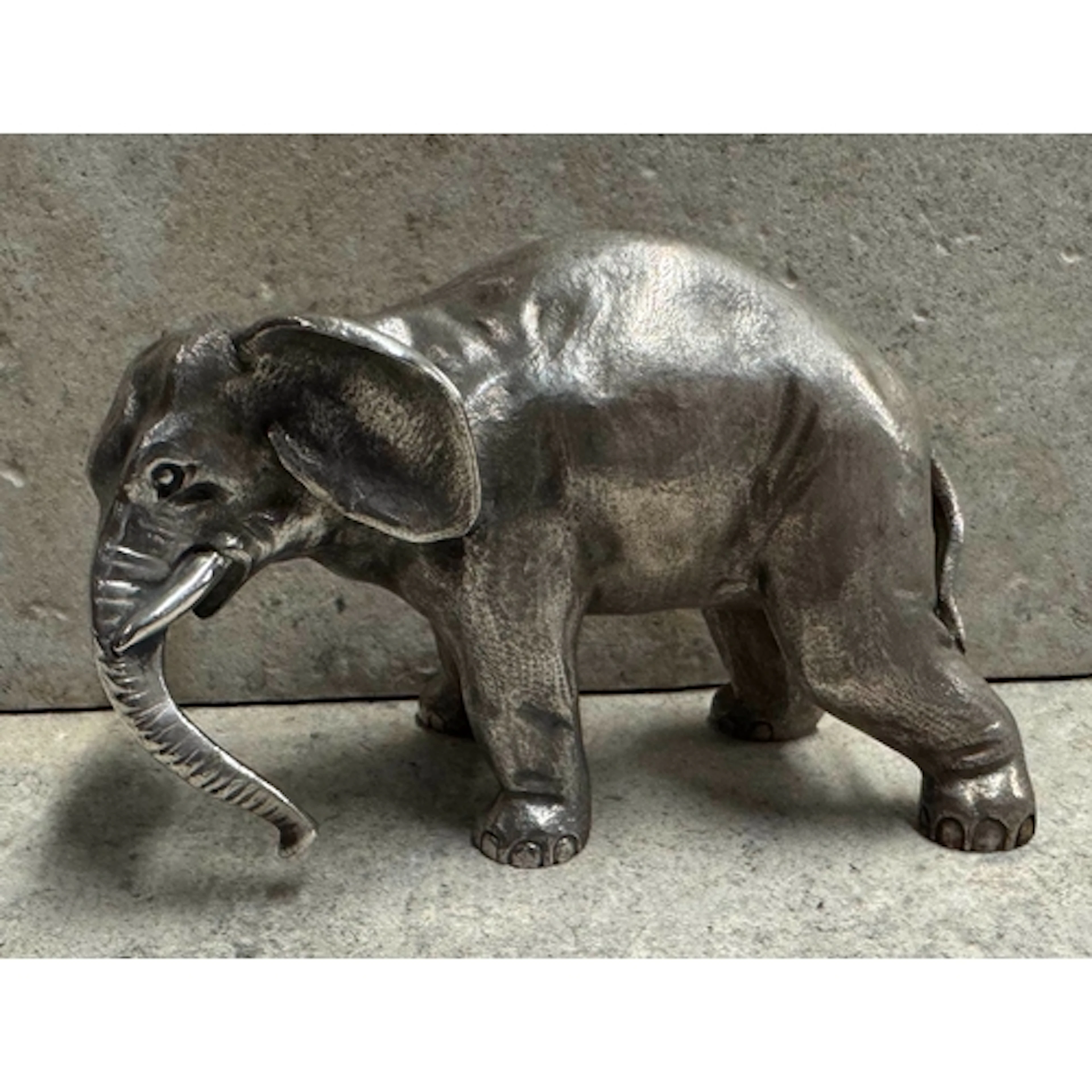 FABERGÉ: A 19th Century Russian silver cast elephant. Approx...