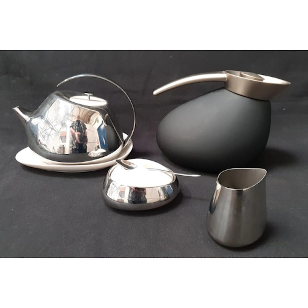 GEORGE JENSEN HELENA TEAPOT with matching saucer, milk jug a...