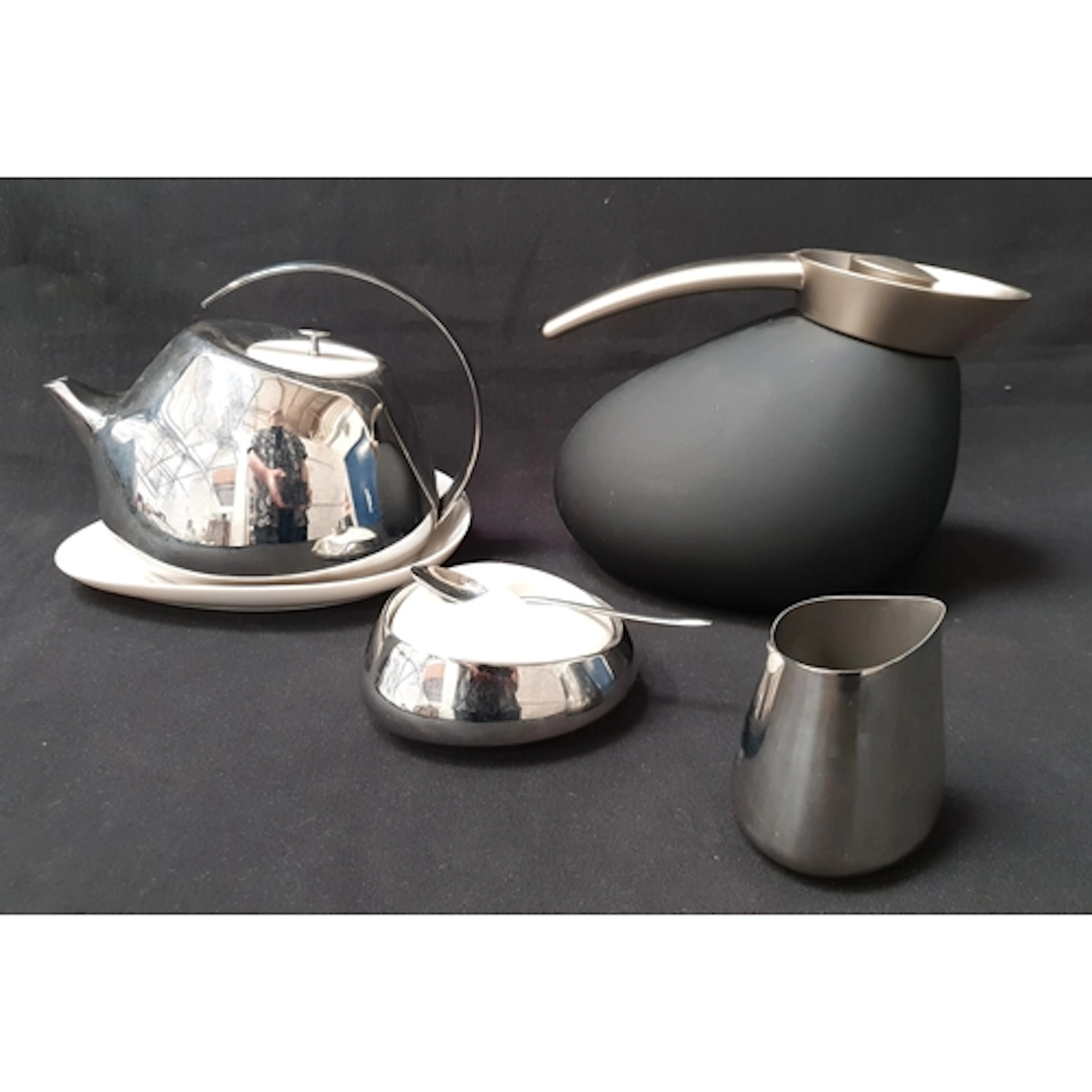 GEORGE JENSEN HELENA TEAPOT with matching saucer, milk jug a...