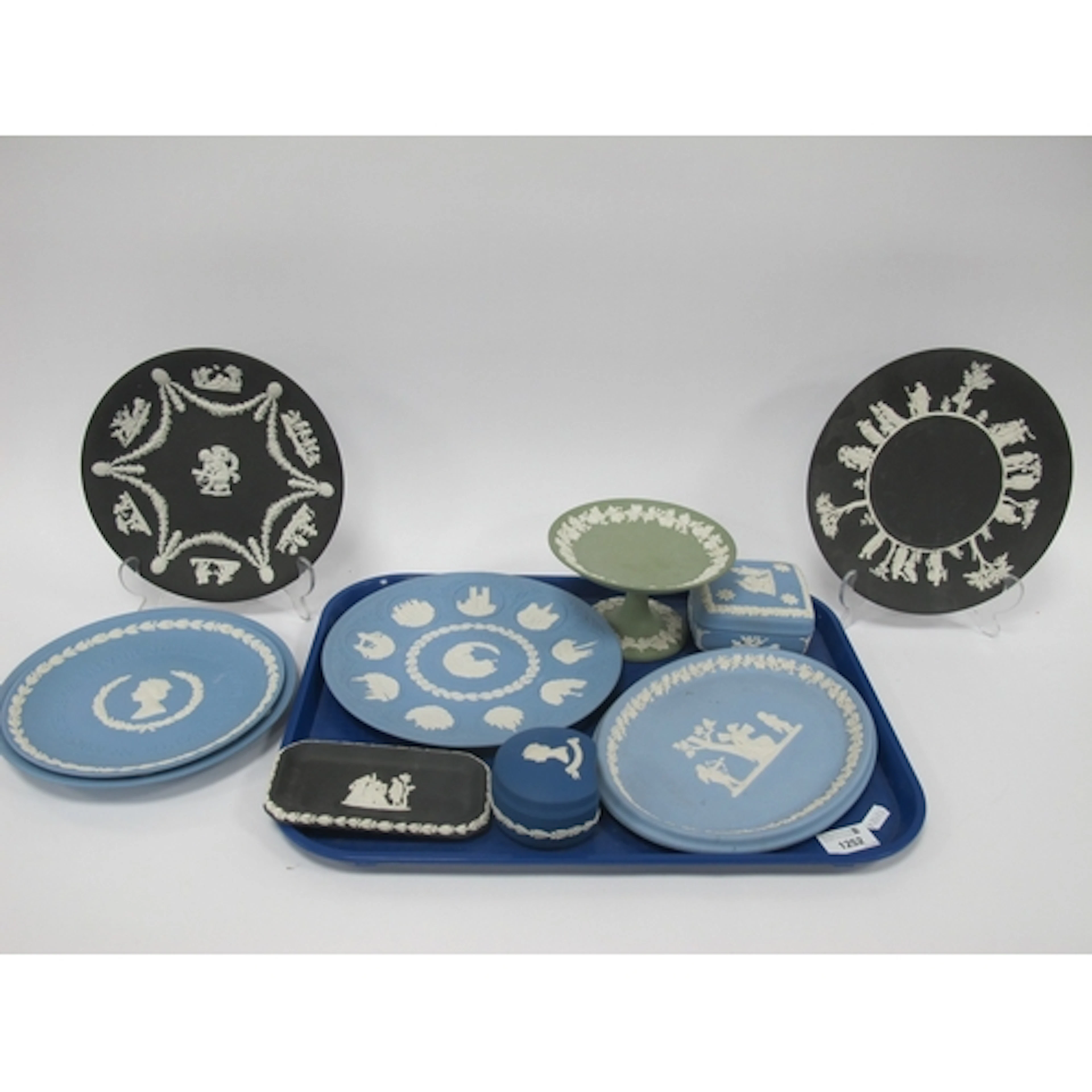 Wedgwood Jasper Ware in powder blue, green, black, dark blue...