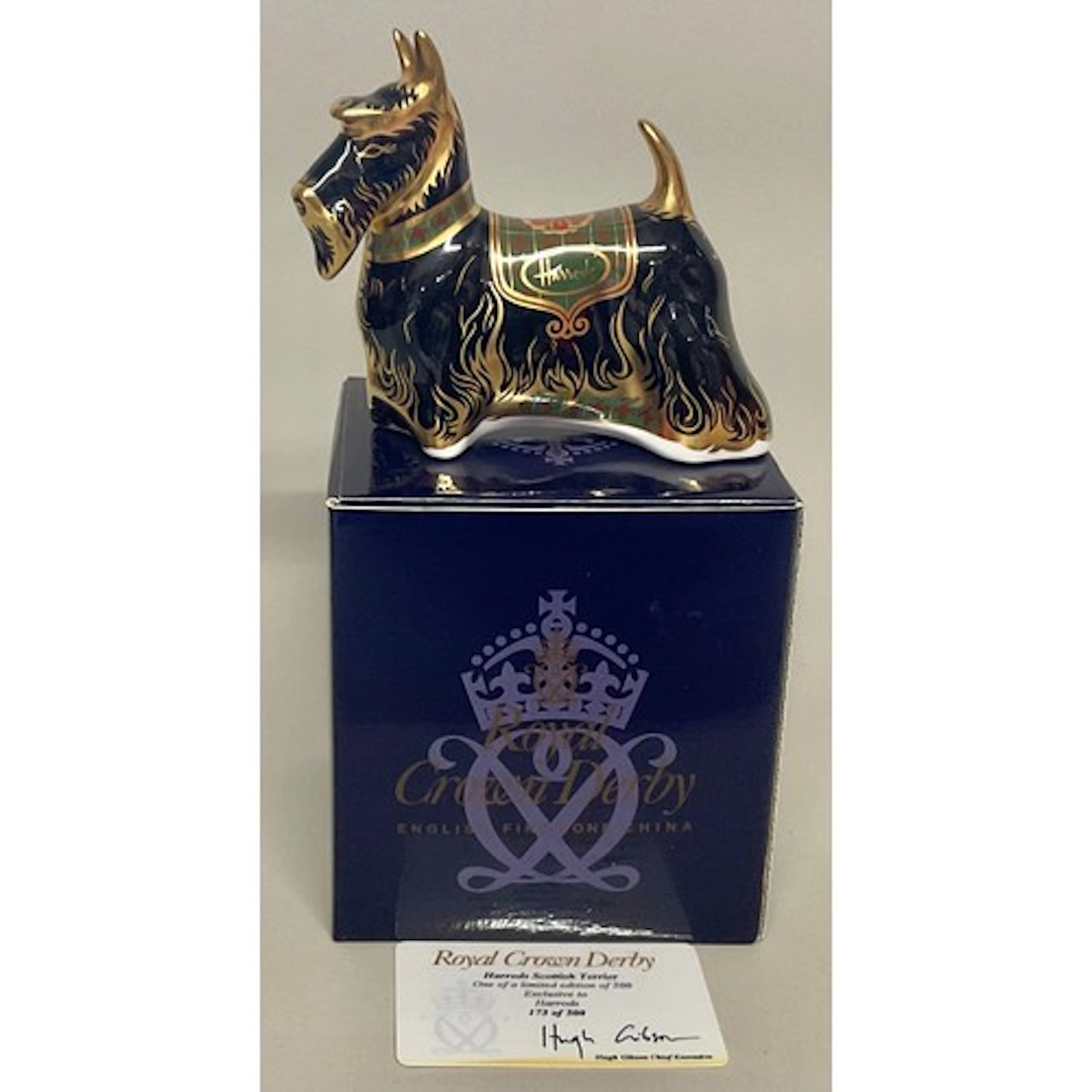 A Royal Crown Derby paperweight, Harrods Scottish Terrier, e...