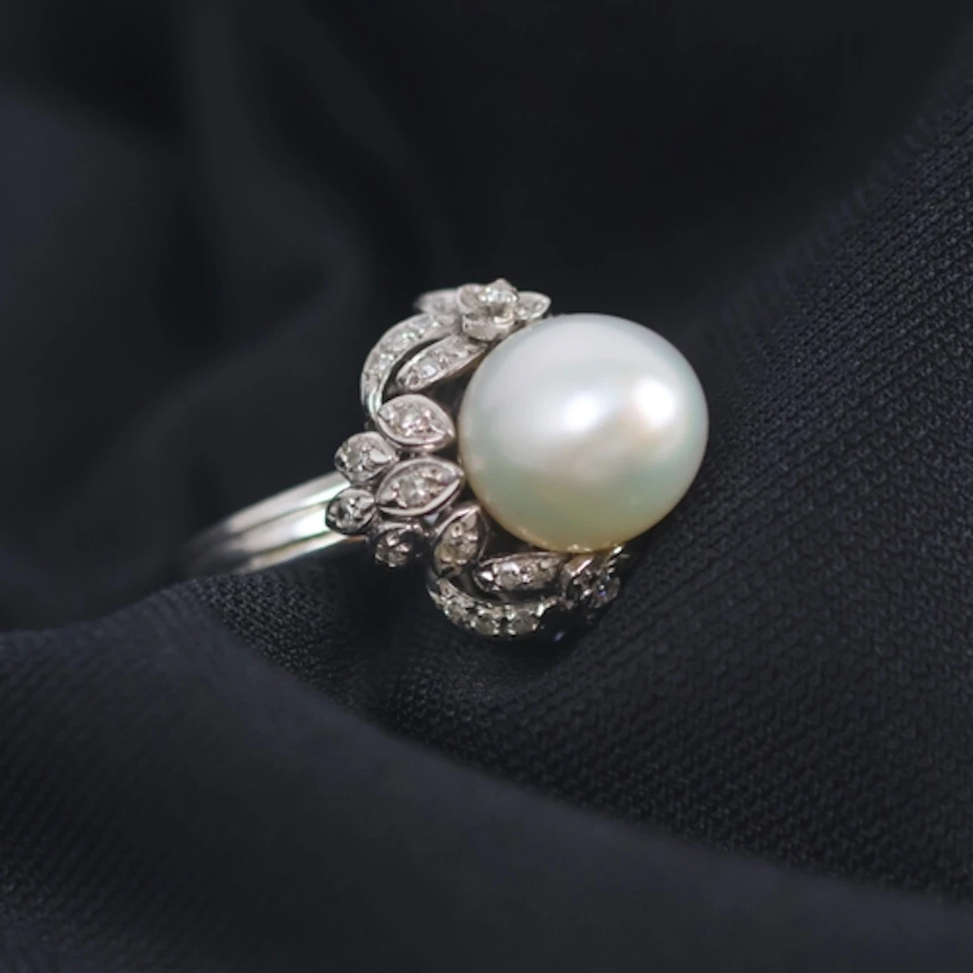 A mid 20th century continental pearl and diamond cluster rin...