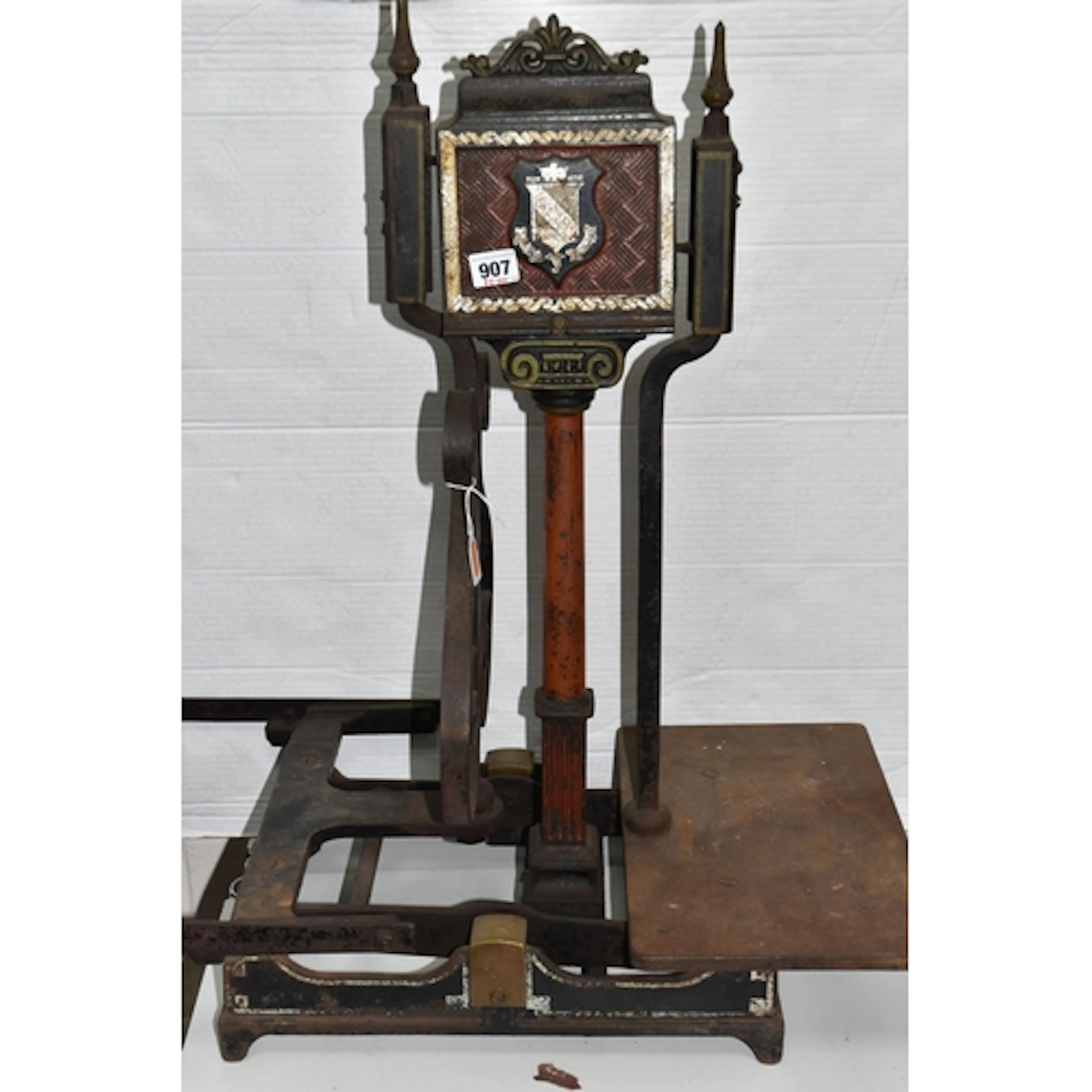 A LARGE ORNATE SET OF INDUSTRIAL WEIGHING SCALES BY W.T. AVE...