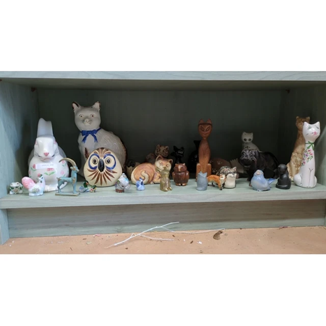 A group of animal-form decorative figures and ornaments in m...
