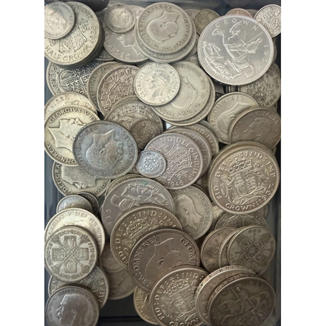 A collection of circulated UK pre-1947 silver coins, denomin...