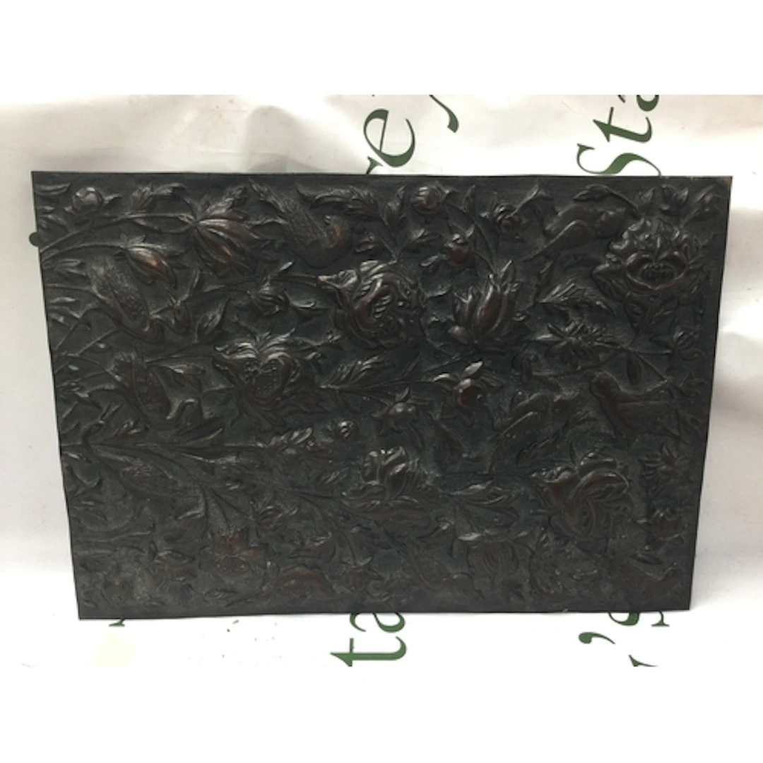 A pressed bronzed metal plaque. NO RESERVE