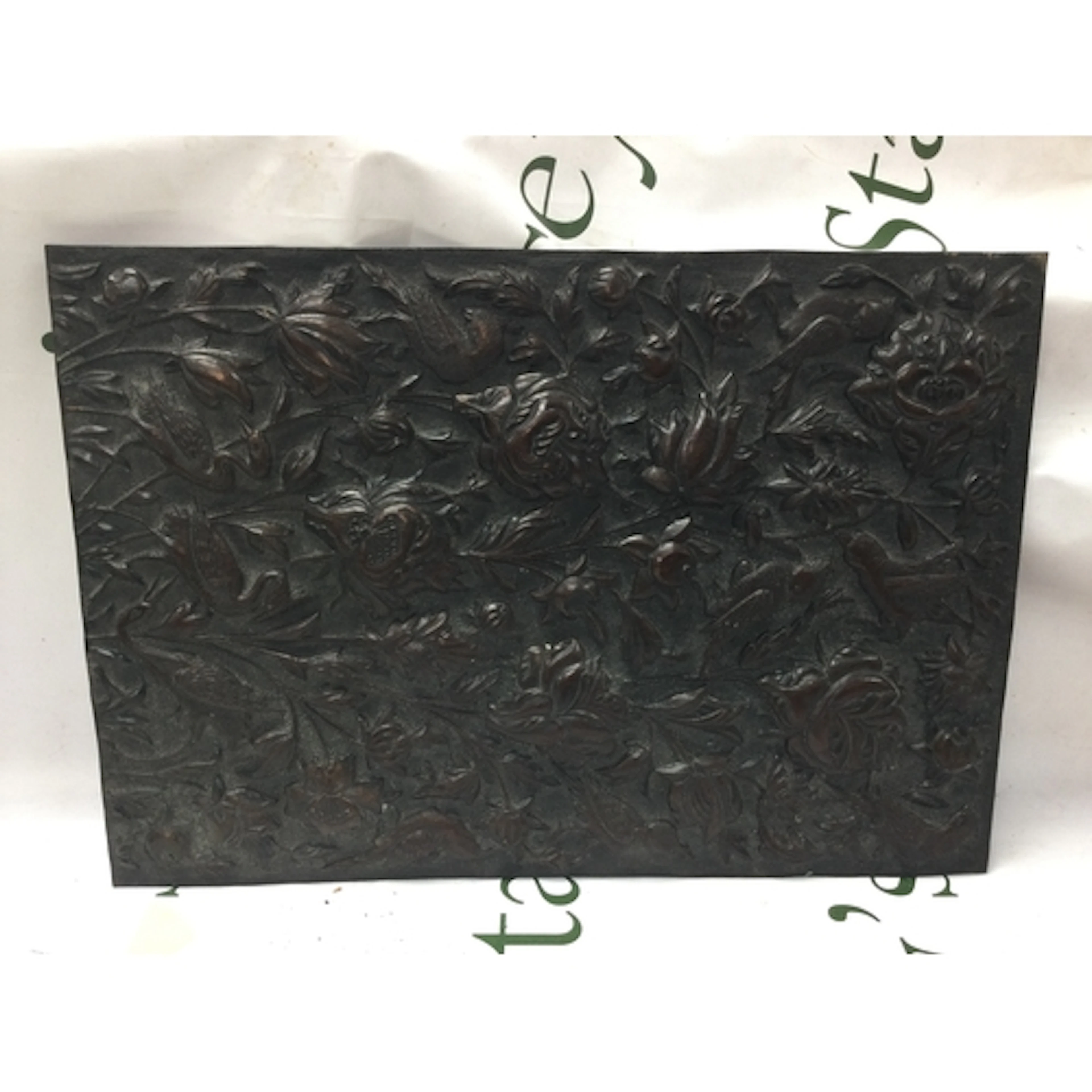 A pressed bronzed metal plaque. NO RESERVE