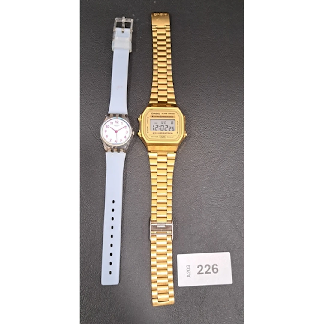 TWO FASHION WRISTWATCHES comprising Casio A168 in gold tone ...