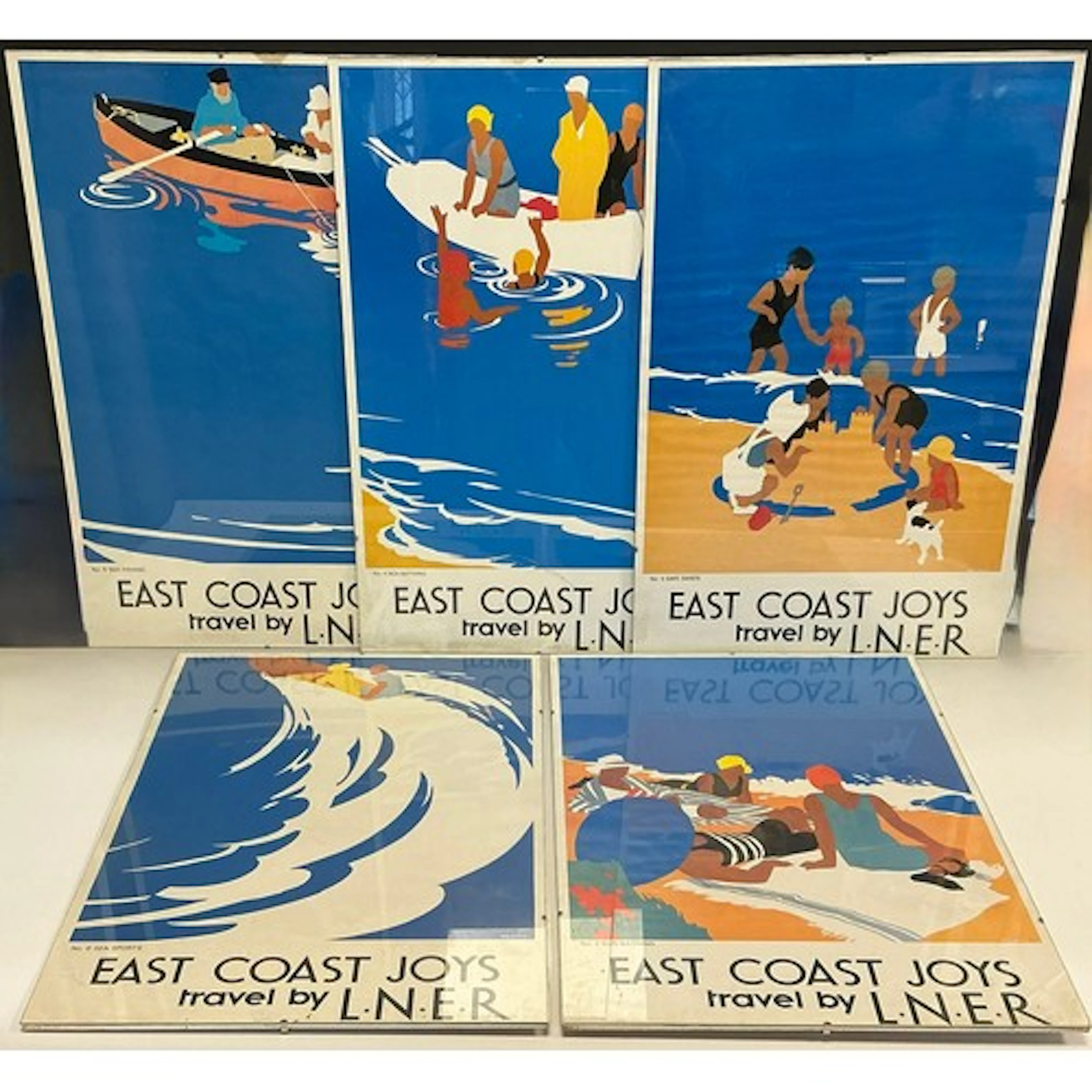 A set of five travel posters, ‘East Coast Joys, travel by LN...