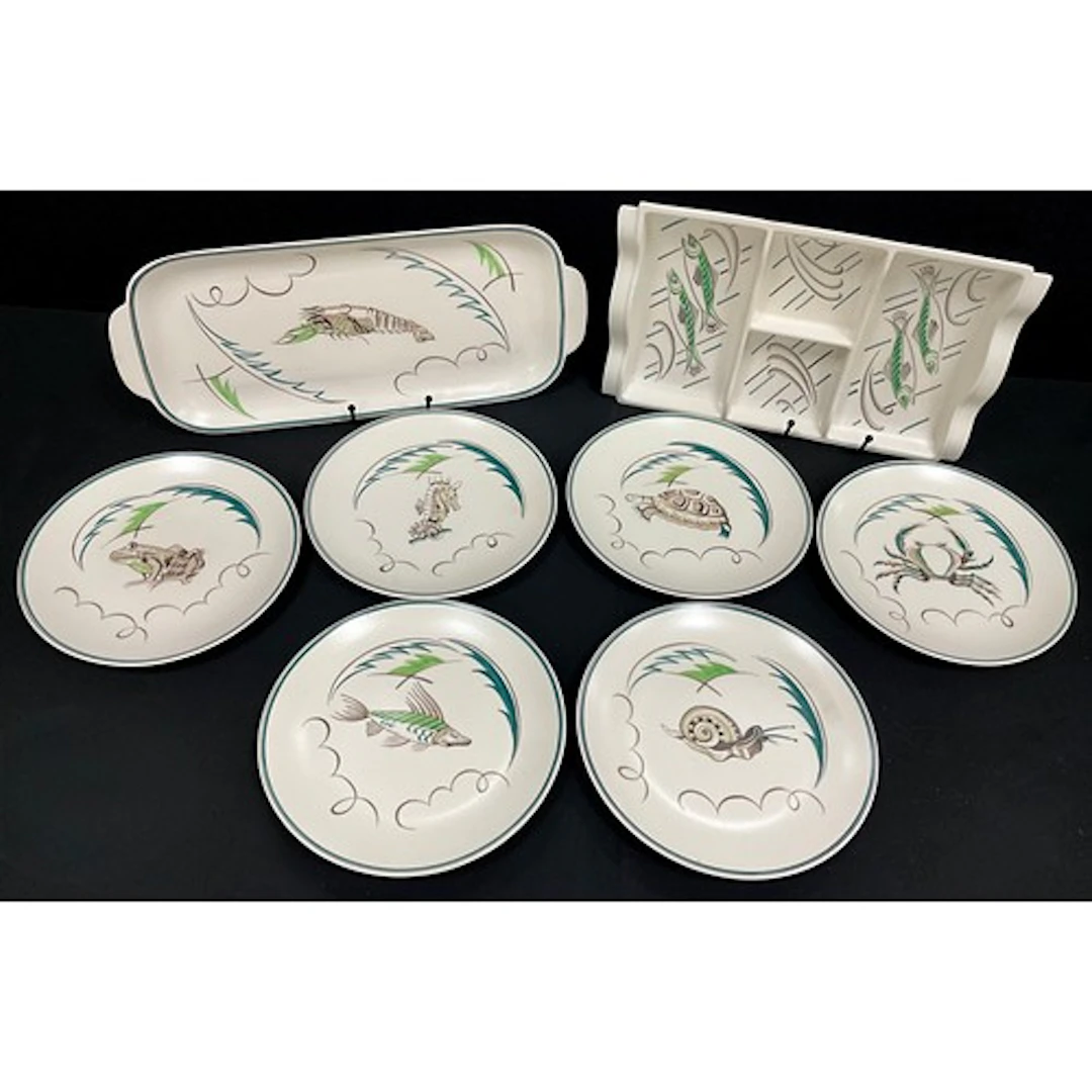 A Poole pottery hors d'oeuvres fish serving dish, similar tr...