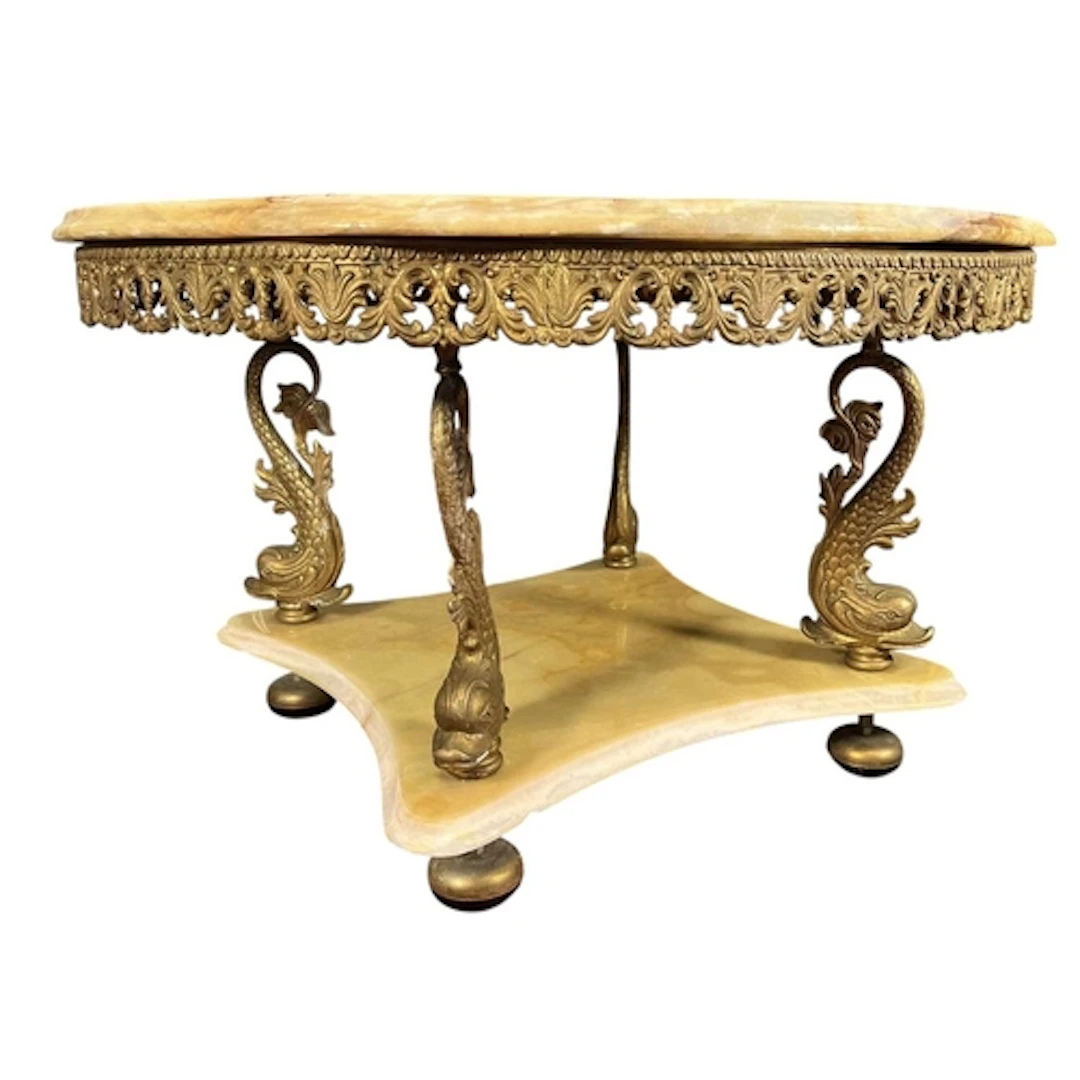 A vintage 20th century Hollywood Regency gilt metal and onyx...
