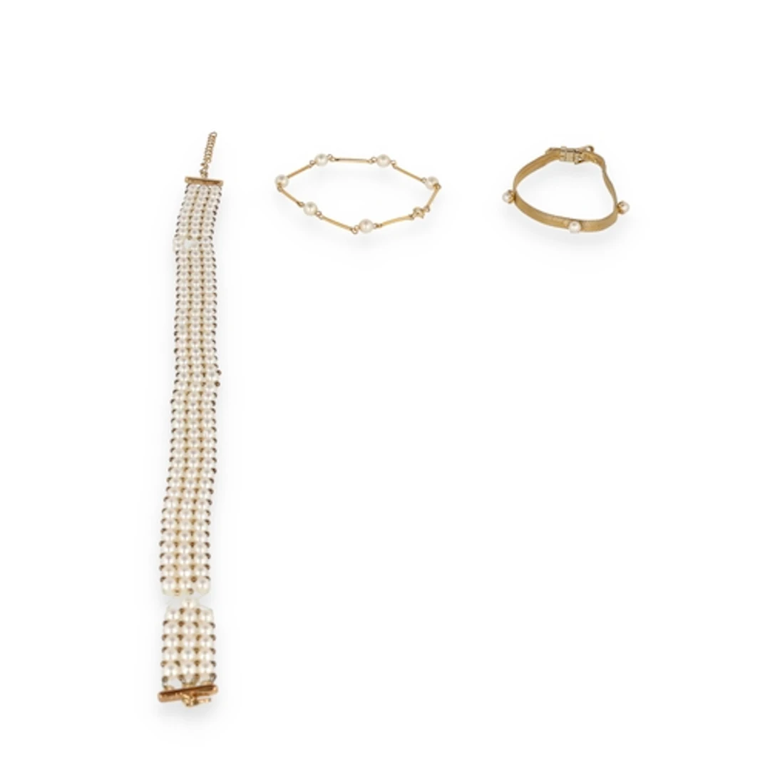 A 9CT GOLD MOUNTED THREE-STRING PEARL NECKLACE Together with...