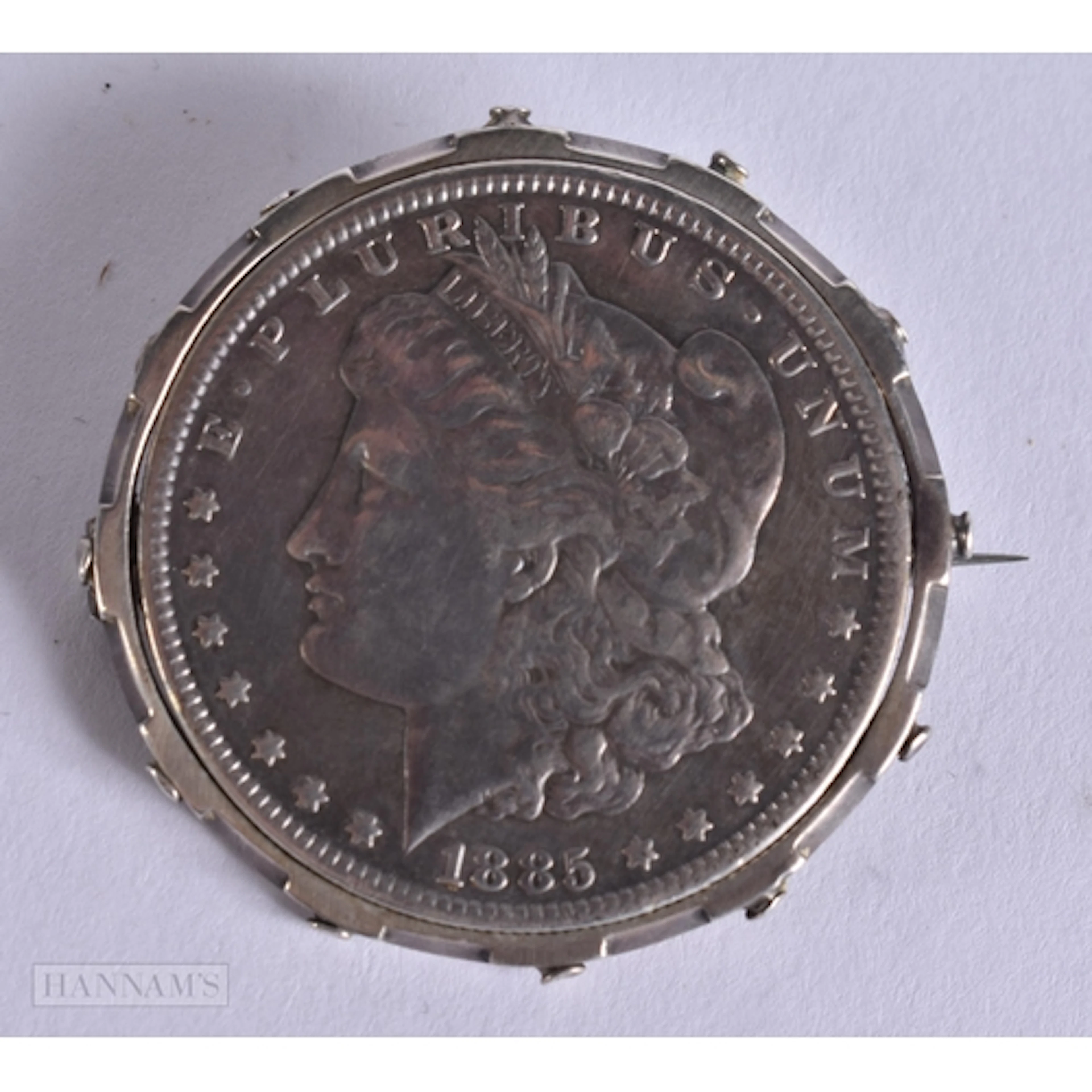 A VICTORIAN SILVER COIN BROOCH. 31 grams. 4.25 cm wide.