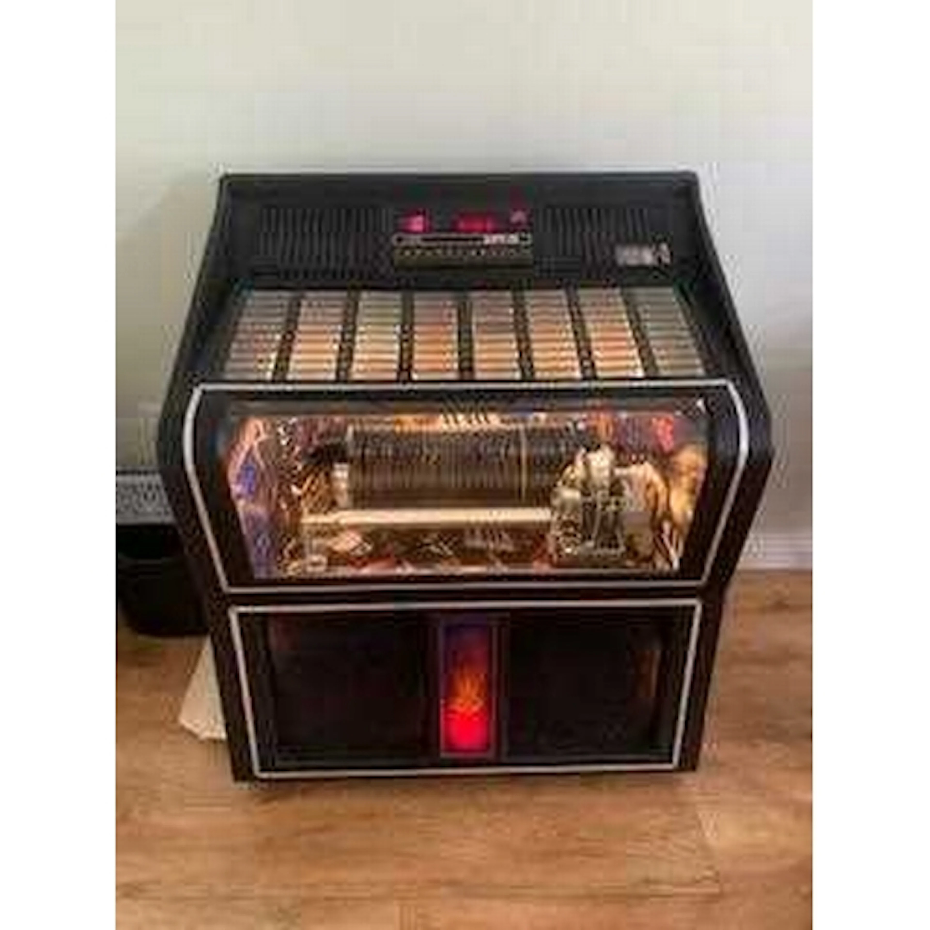 A Vintage NSM City II EIS II ST Vinyl Jukebox. The jukebox m...