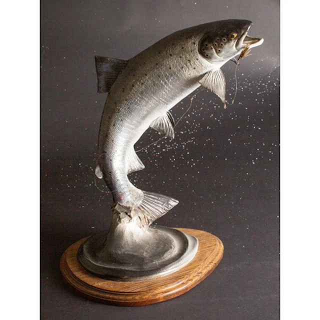 Peter Lowerson. A large fish sculpture of a leaping Salmon c...