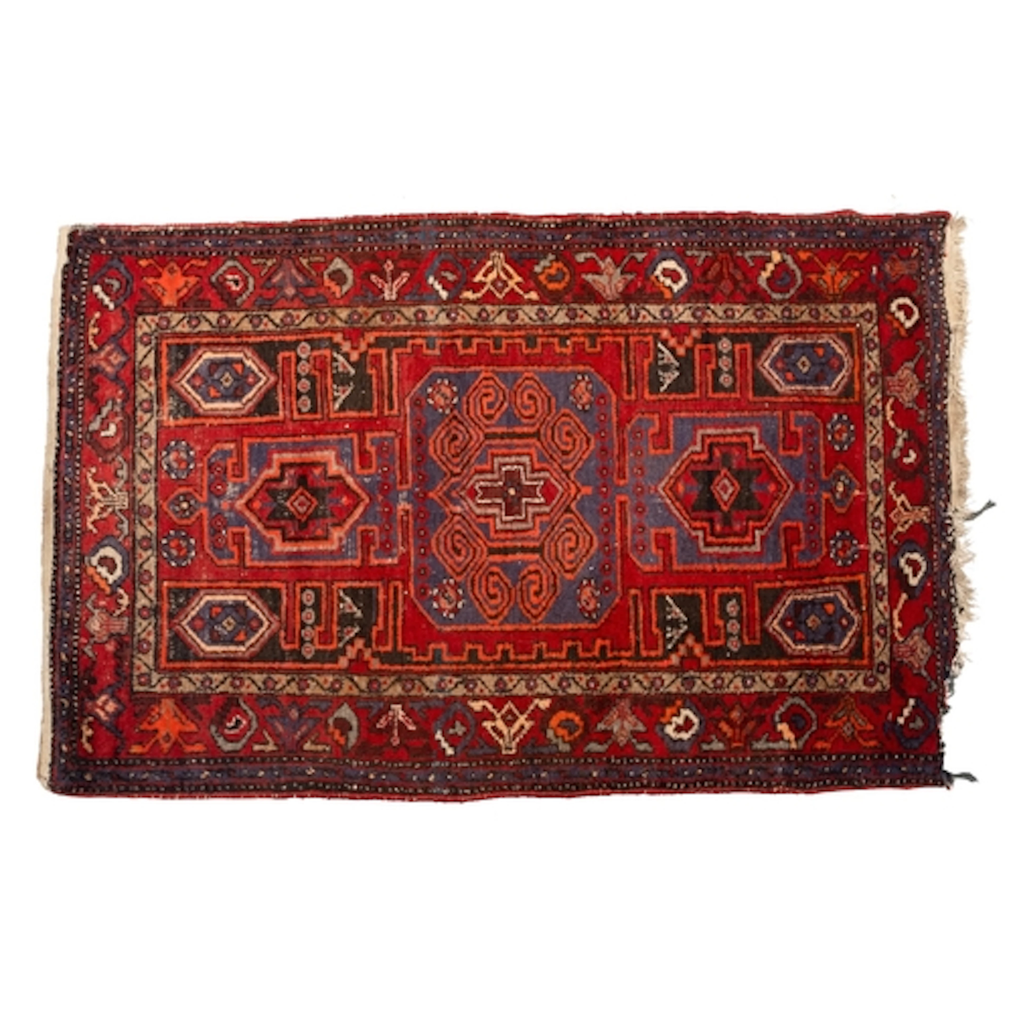 An Afghan Belouch rug, the wine field with geometric medalli...