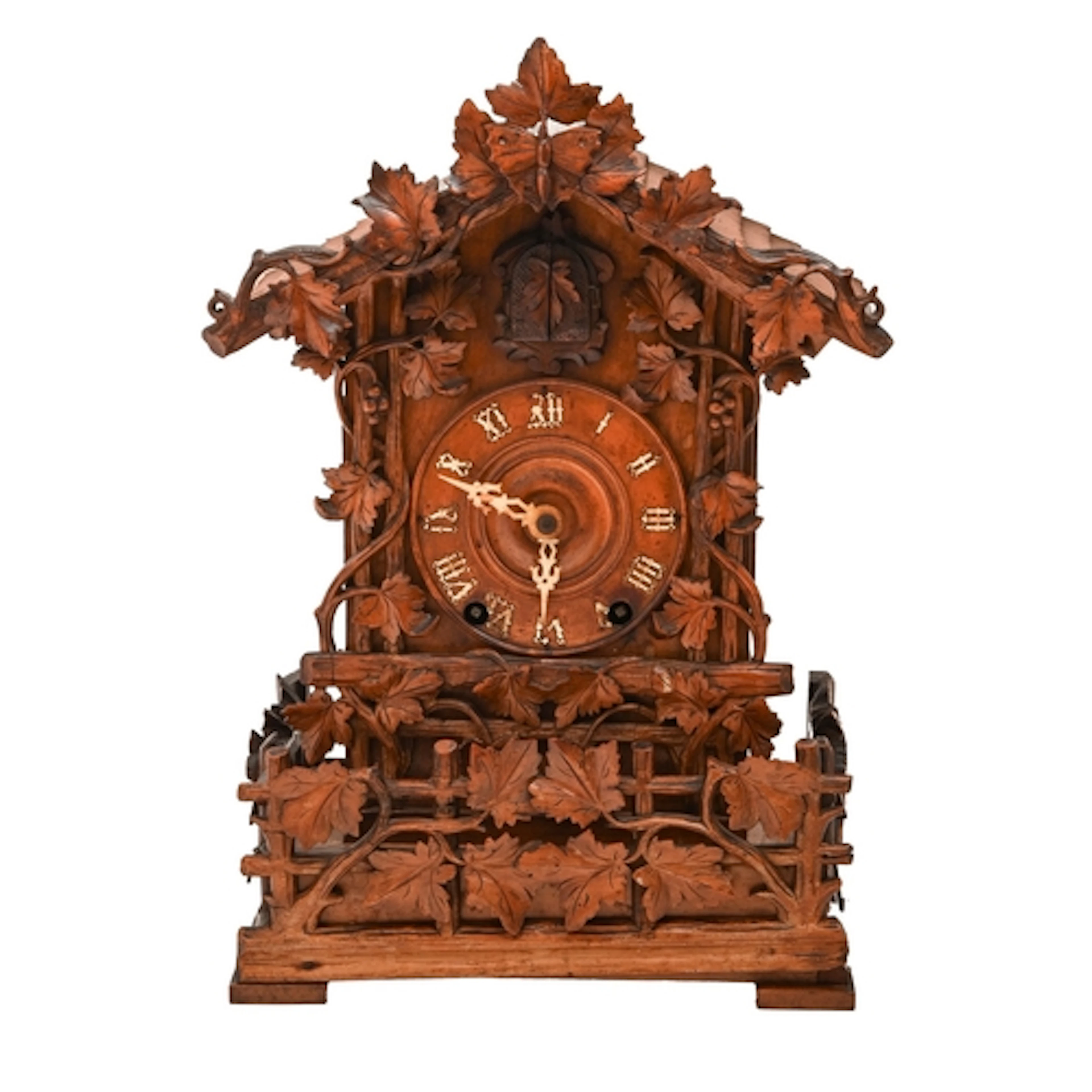 A Black Forest carved and stained wood cuckoo clock, Camerer...