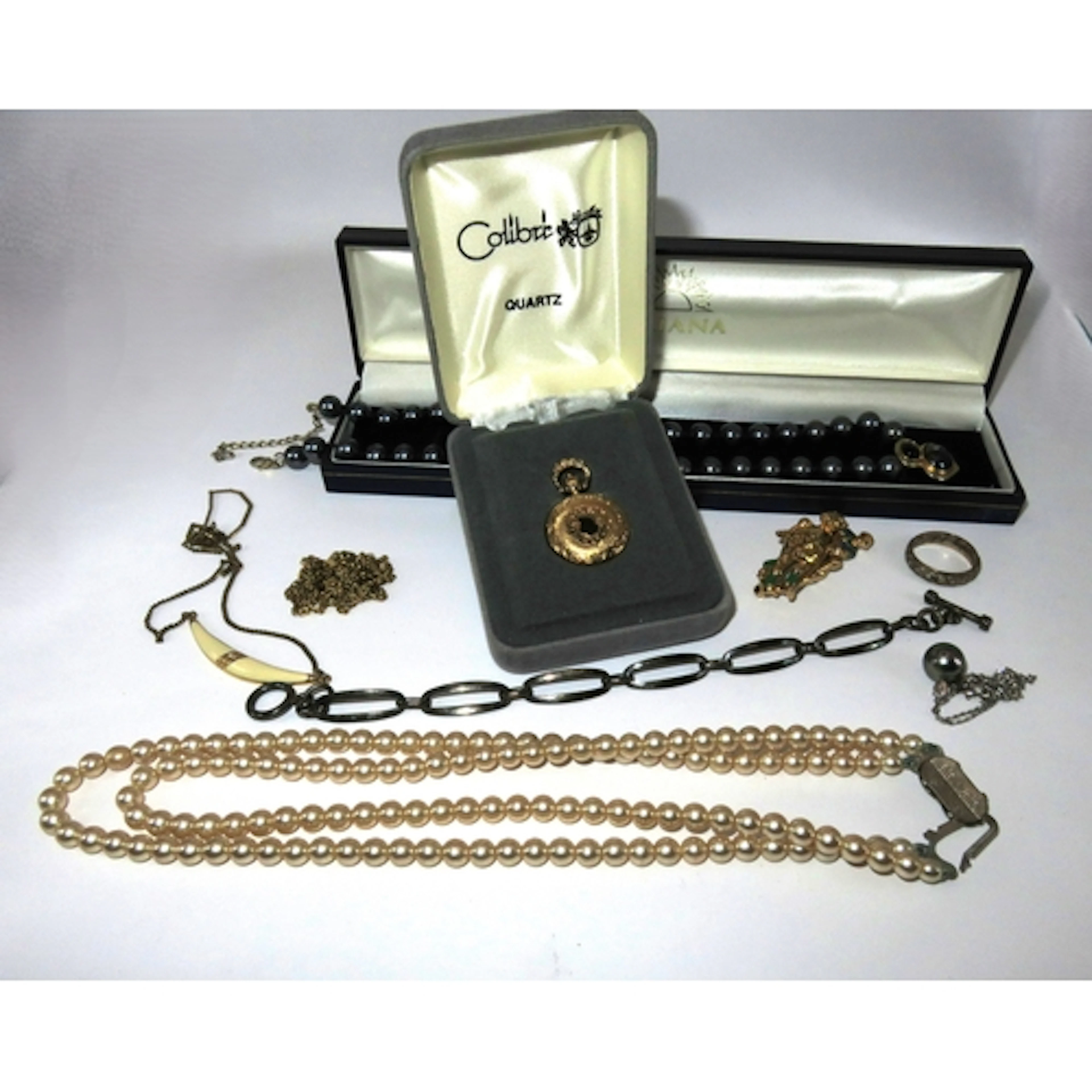 Colibri gold plated pendant watch on chain, silver bracelet,...