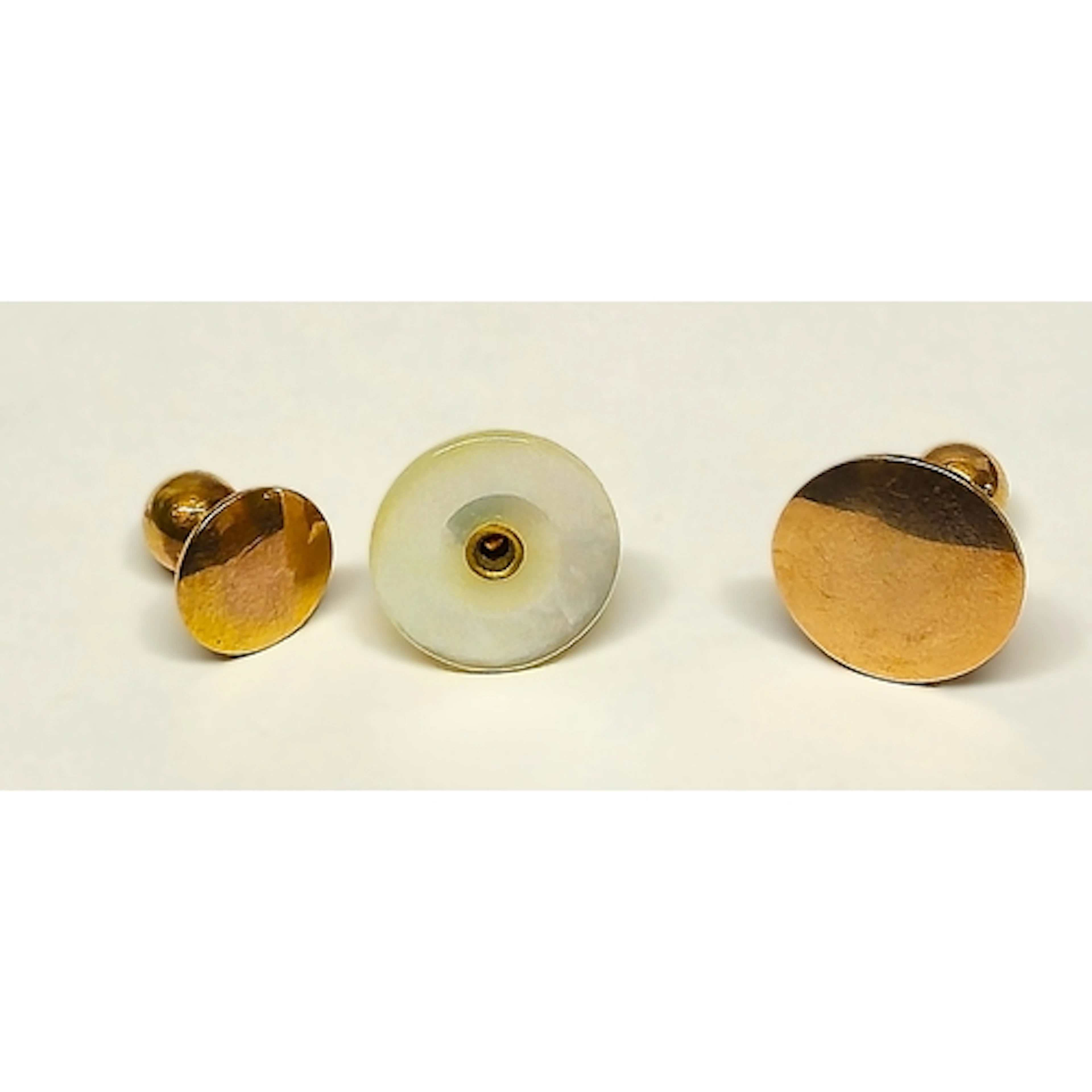Two 9ct gold studs, 375, 2.7g gross, and another mother of p...